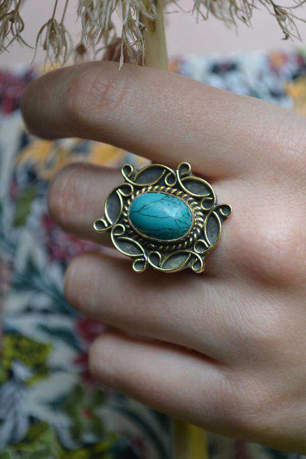 A detailed image of the Sensual Stone Ring featuring a semi-precious stone set in an intricate brass design, showcasing its elegance and craftsmanship.