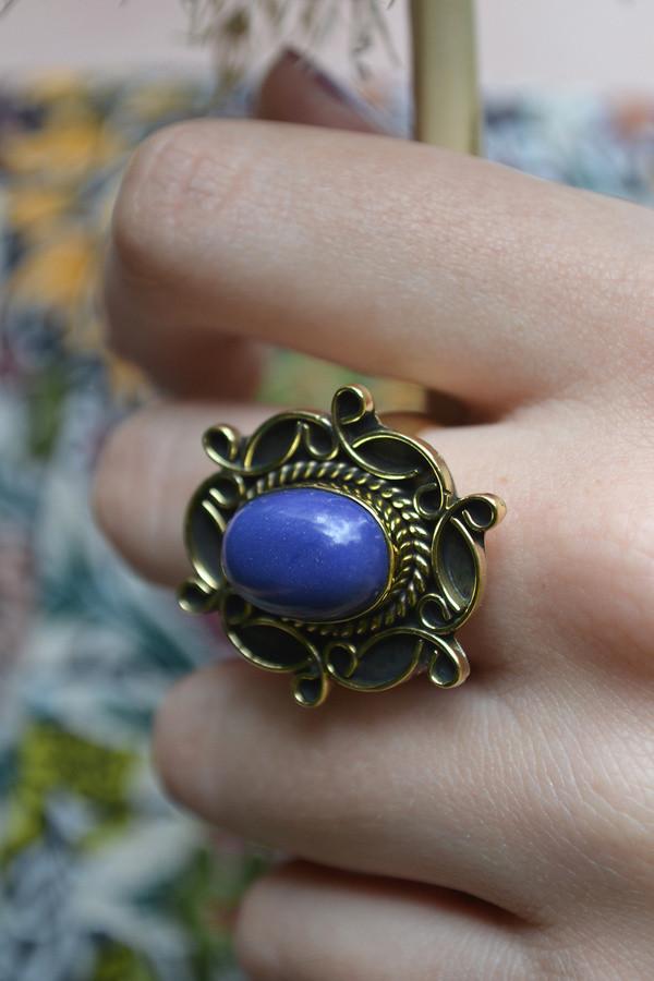 A detailed image of the Sensual Stone Ring featuring a semi-precious stone set in an intricate brass design, showcasing its elegance and craftsmanship.