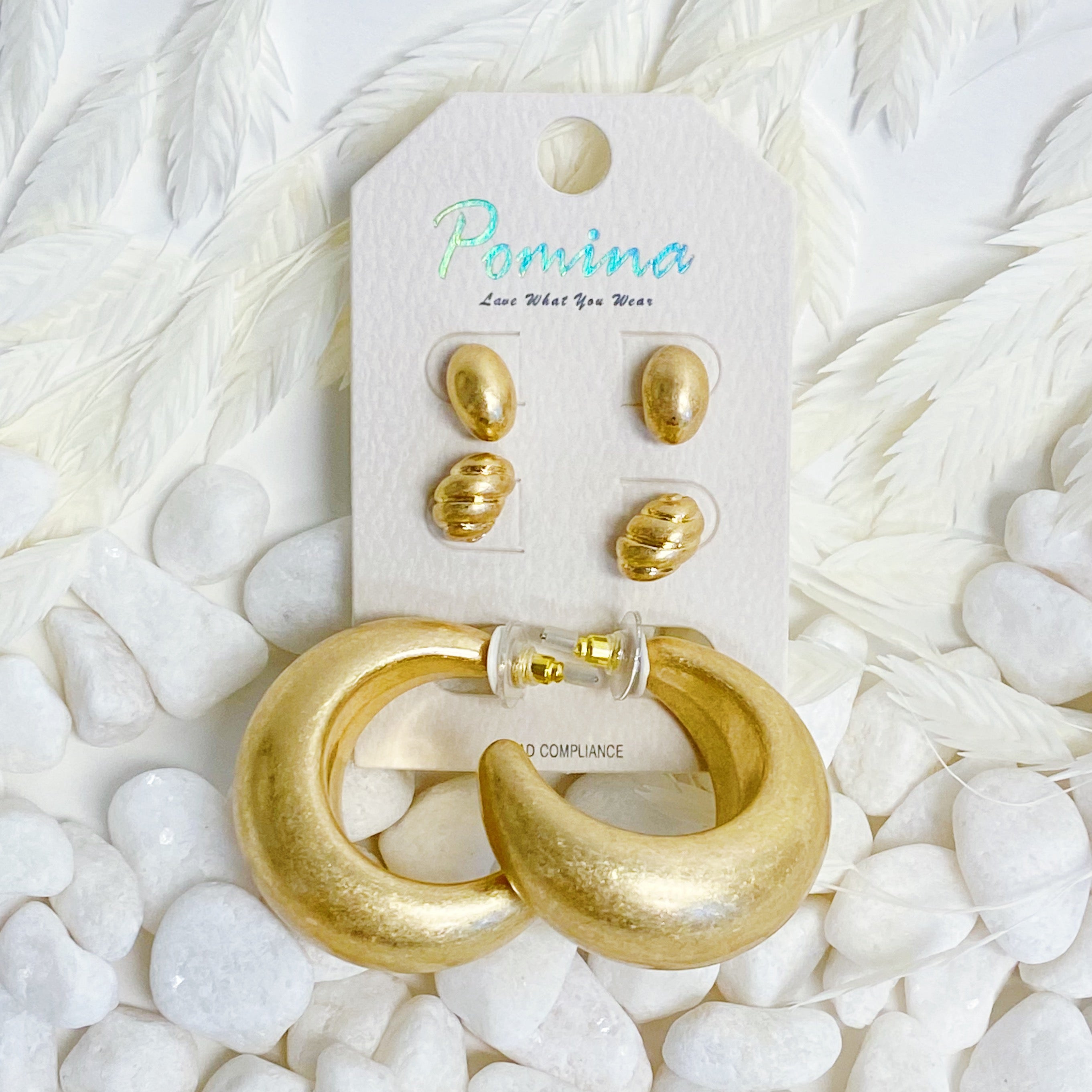 Set of 3 pairs of hoop earrings featuring small classy studs and bold larger hoops, gold plated alloy metal design.