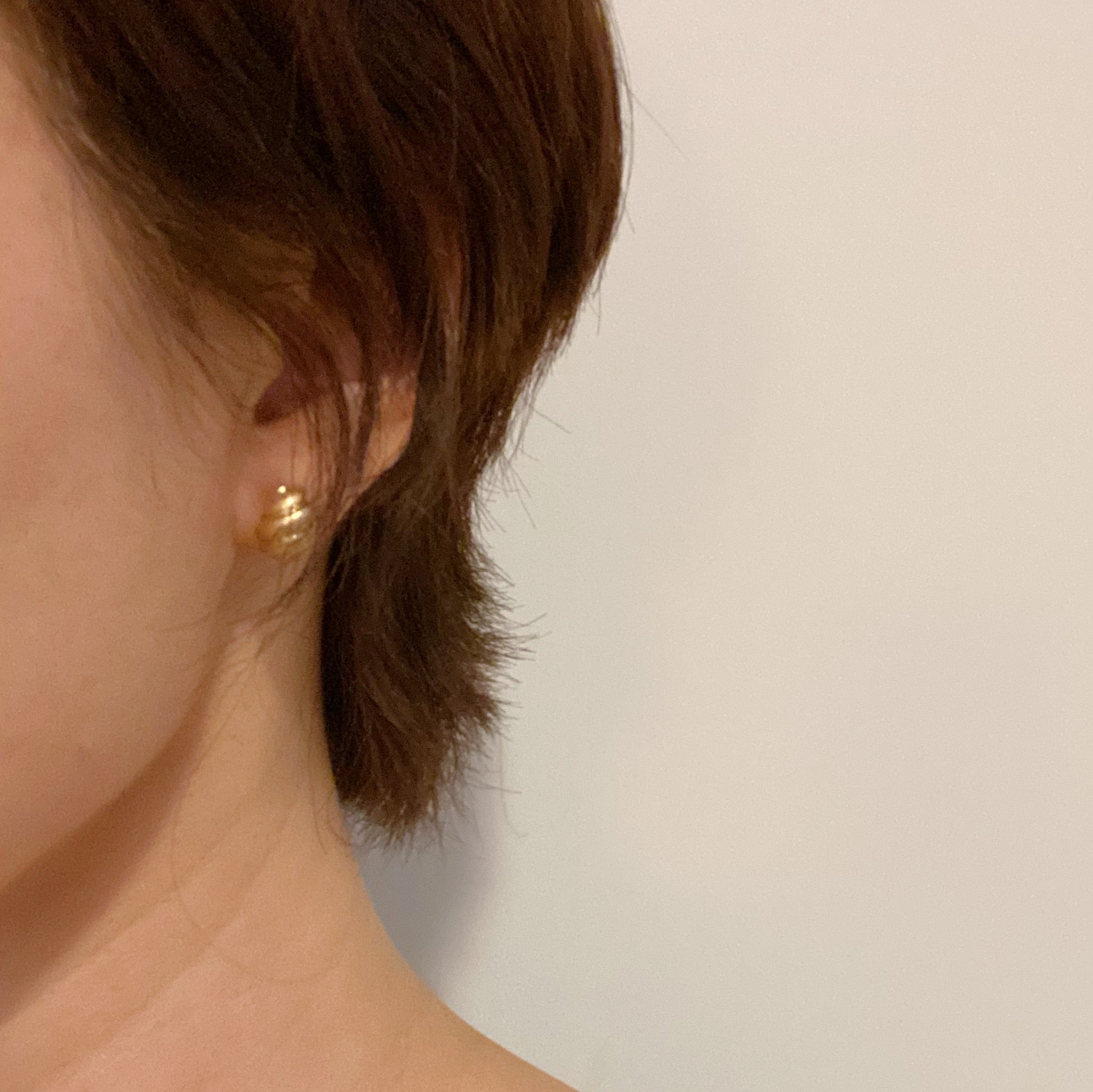 Set of 3 pairs of hoop earrings featuring small classy studs and bold larger hoops, gold plated alloy metal design.