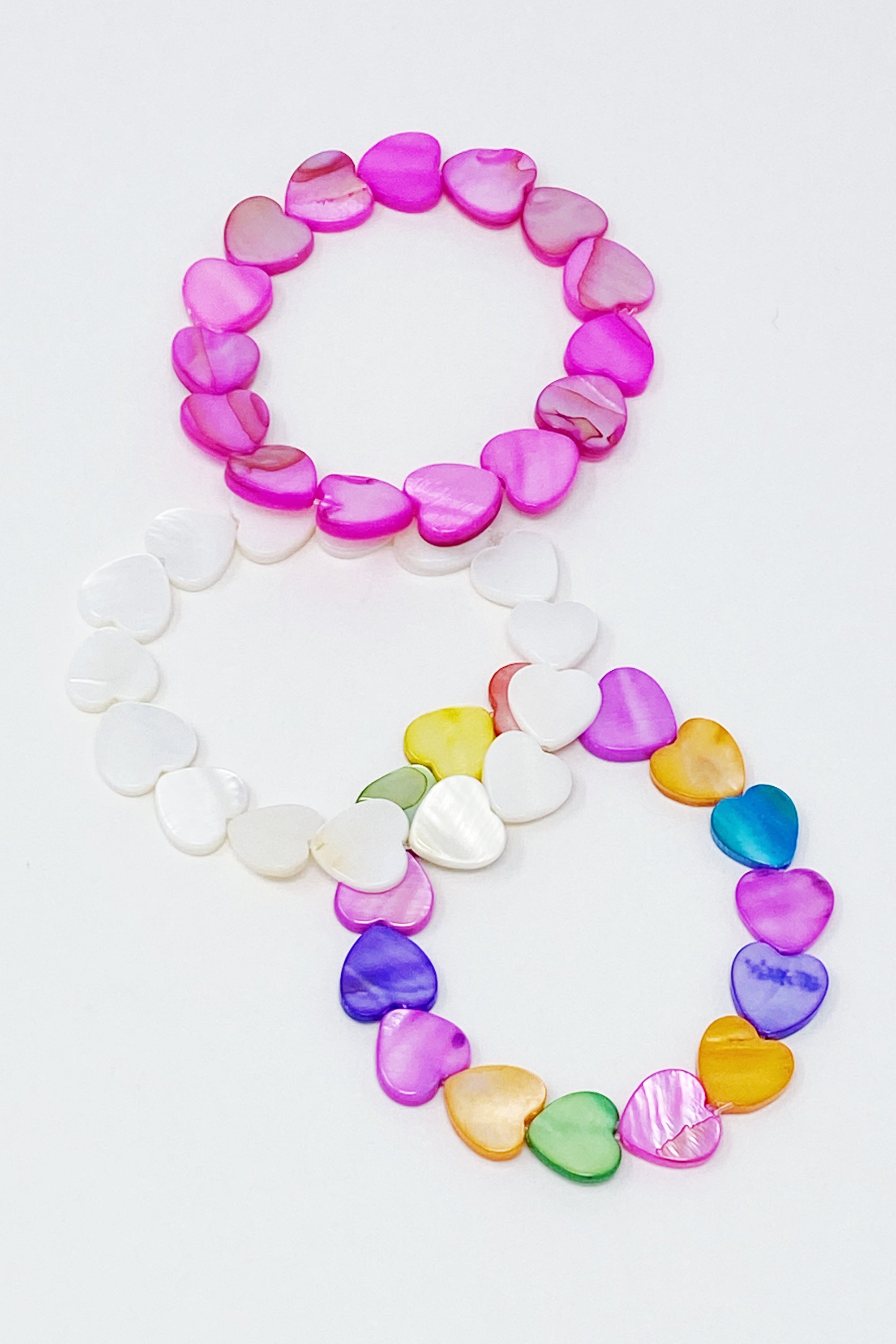 Colorful Shelly Heart Stretch Bracelet featuring heart-shaped shell beads in various hues, designed for comfort and style.