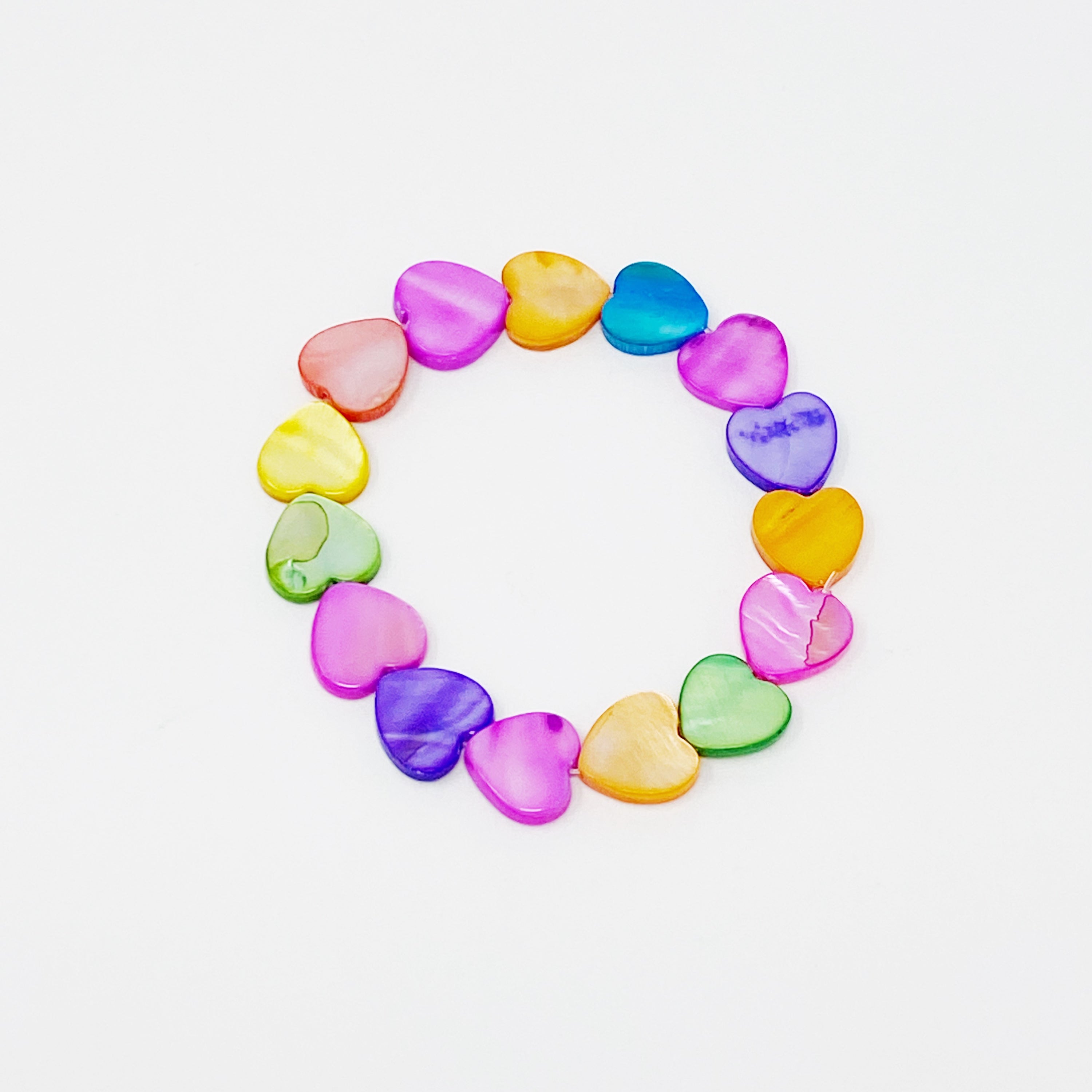 Colorful Shelly Heart Stretch Bracelet featuring heart-shaped shell beads in various hues, designed for comfort and style.