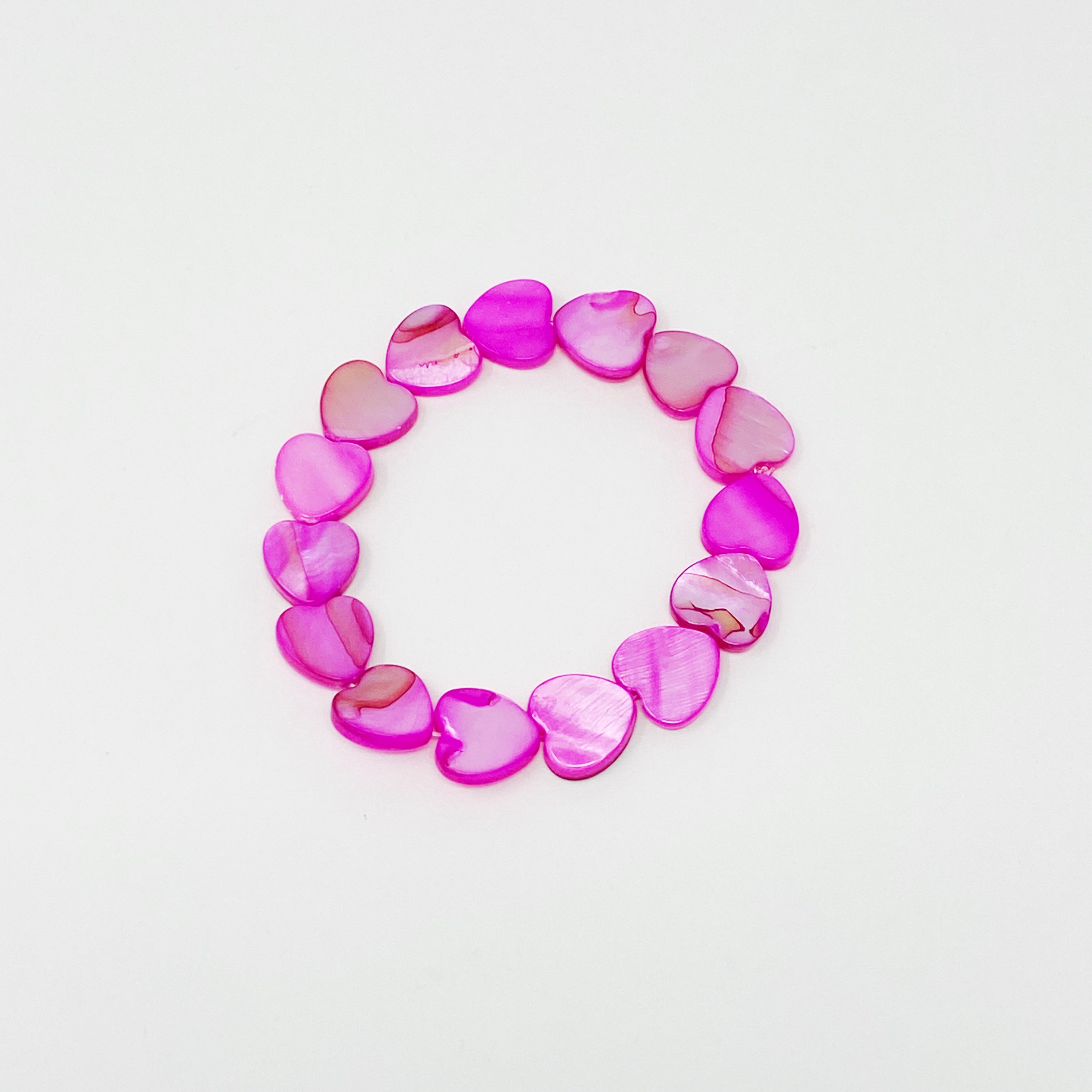 Colorful Shelly Heart Stretch Bracelet featuring heart-shaped shell beads in various hues, designed for comfort and style.