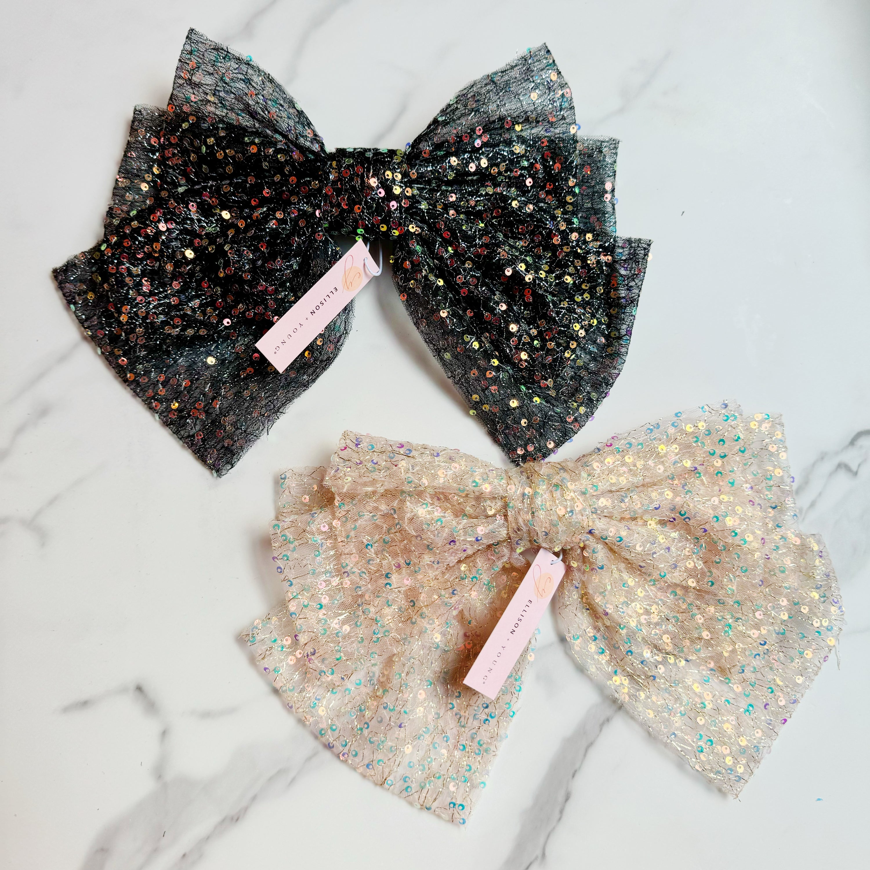 Shimmer Lover Bow Hair Clip featuring an elegant bow design with a shimmering finish, perfect for stylish hairdos.