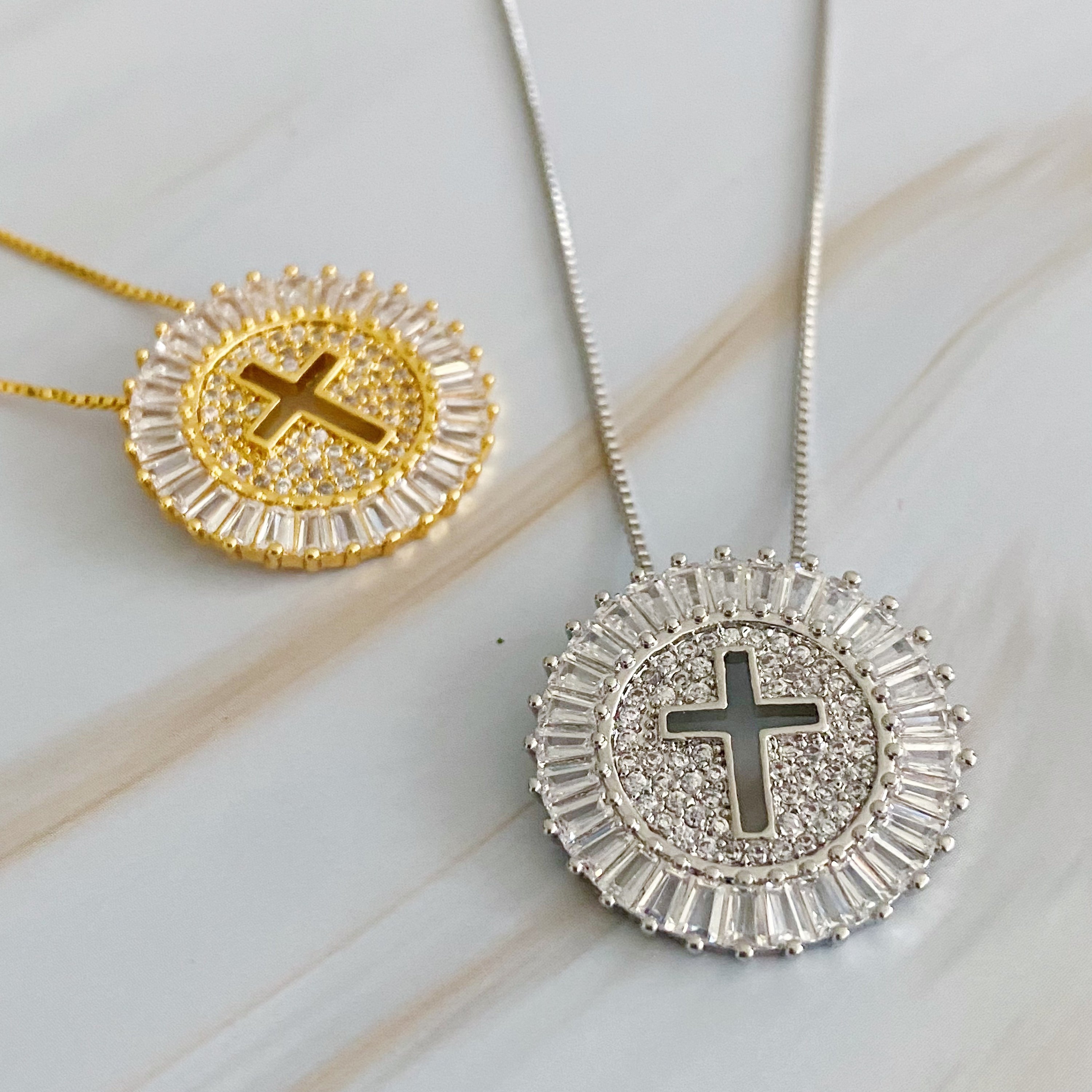 Shine Circle Cross Necklace featuring a sparkly round charm with a cut-out cross design, plated brass, and cubic zirconia.