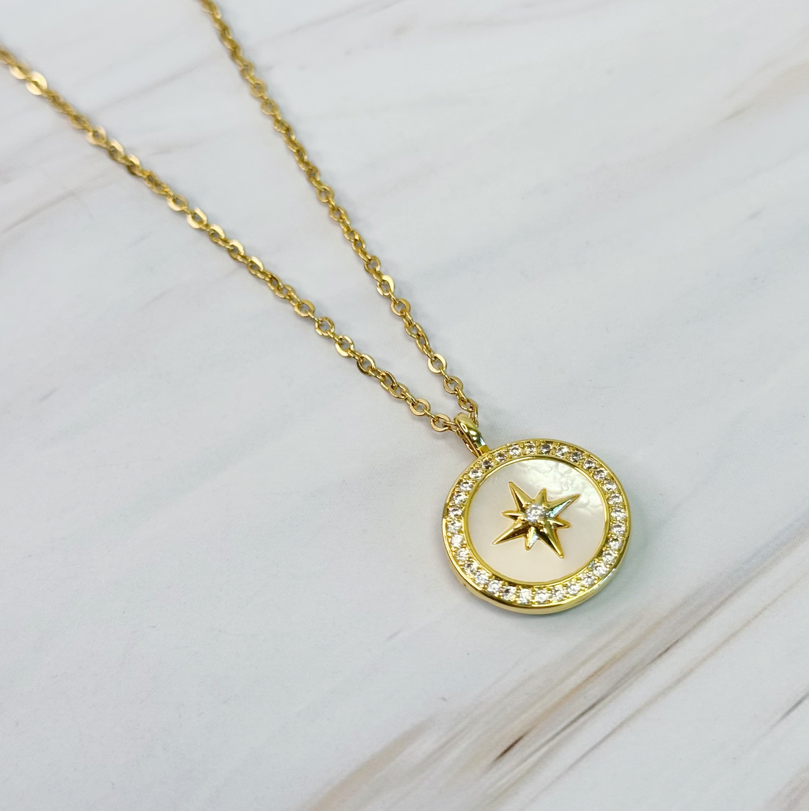 Shine Compass Open Locket Pendant Necklace featuring a round locket with a compass symbol and shiny stones, elegantly designed on an 18-inch chain.