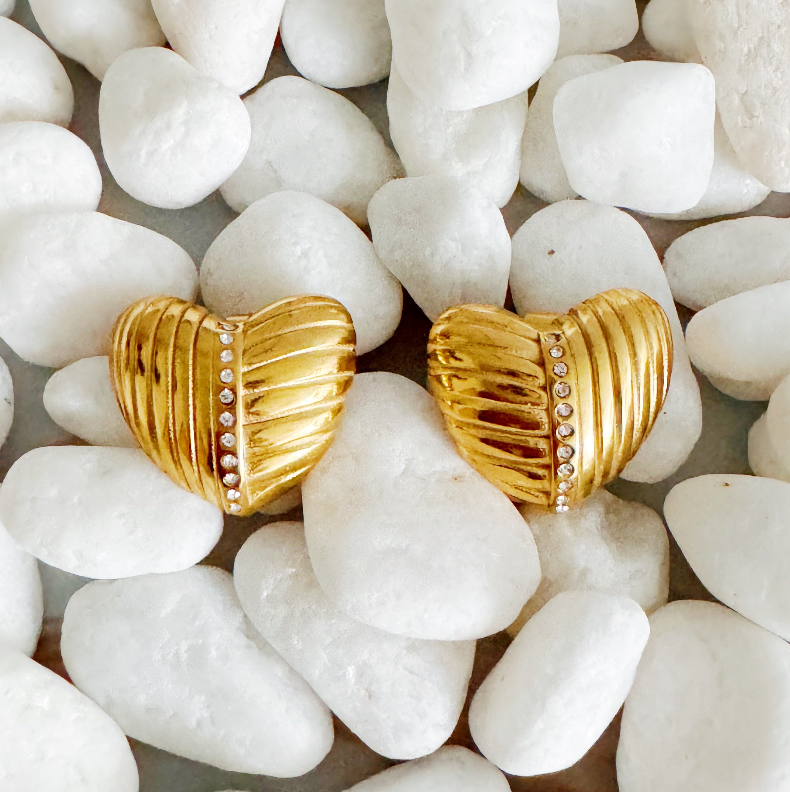 Shine Connects Us Heart Earrings featuring a textured design in 18k gold plated stainless steel, showcasing elegance and shine.