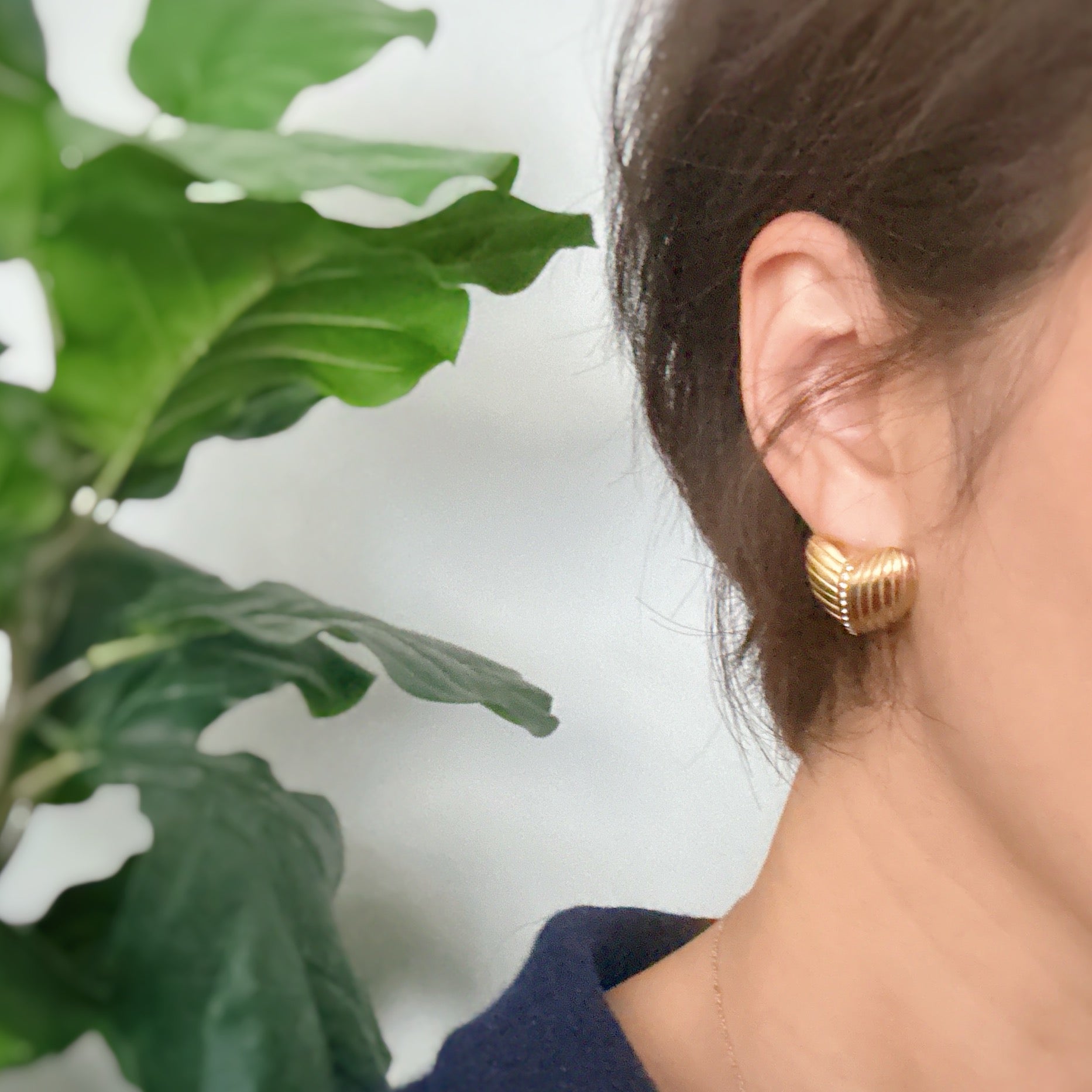 Shine Connects Us Heart Earrings featuring a textured design in 18k gold plated stainless steel, showcasing elegance and shine.