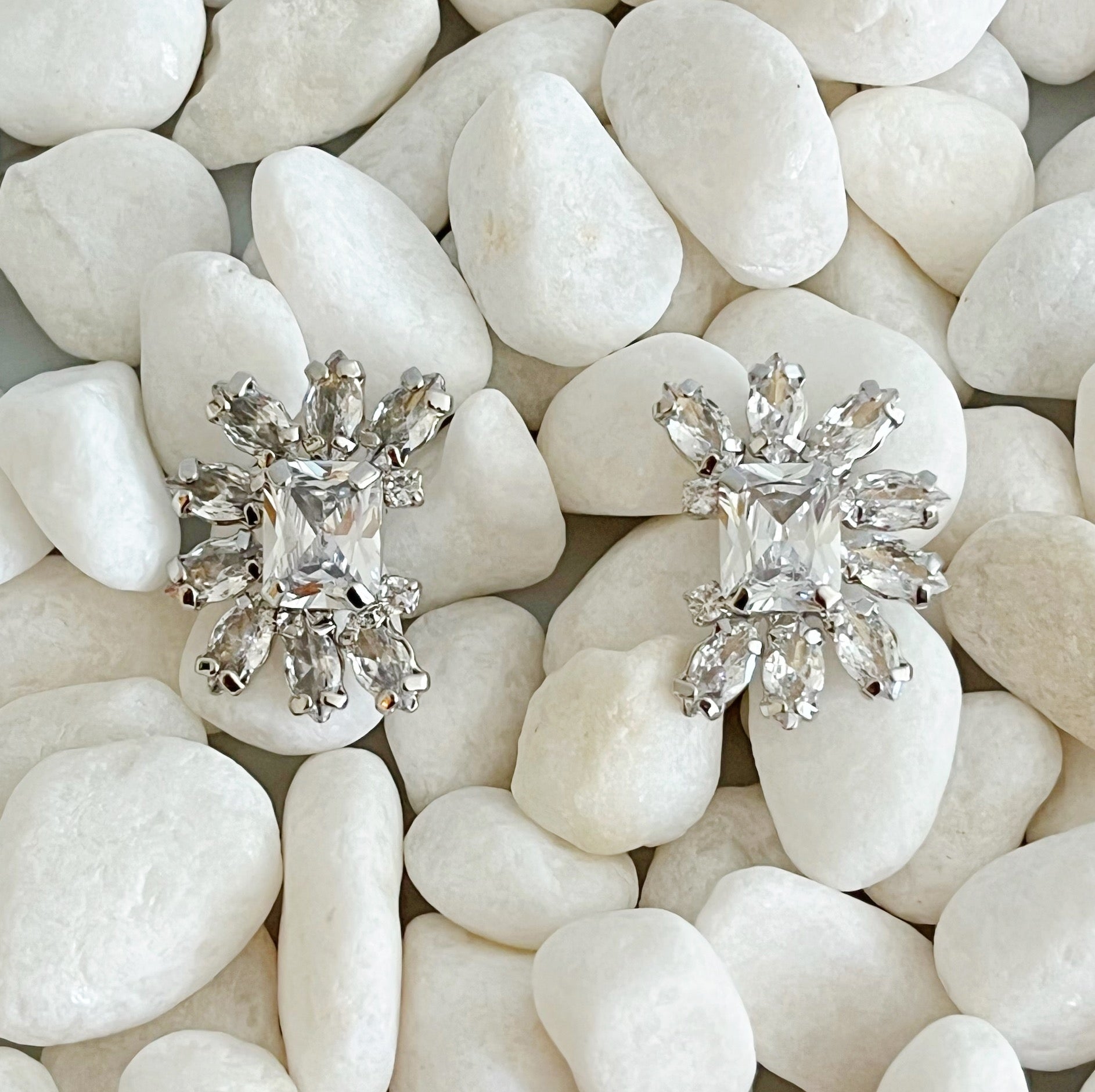 Shine Crusted Jewel Stud Earrings featuring sparkling glass stones on rhodium plated brass, elegantly designed for versatile styling.