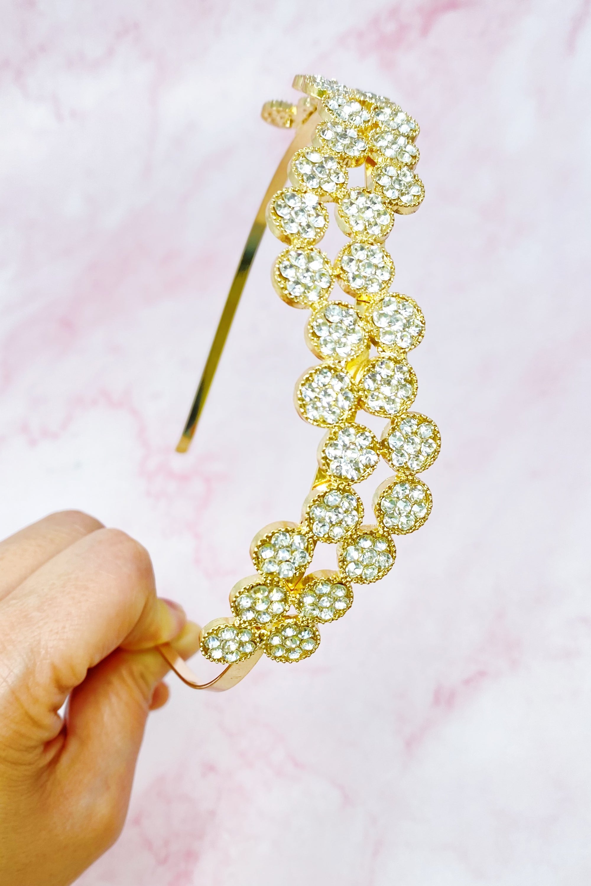 Shines In Circles Headband featuring sparkly circles in a wavy design, perfect for enhancing outfits.