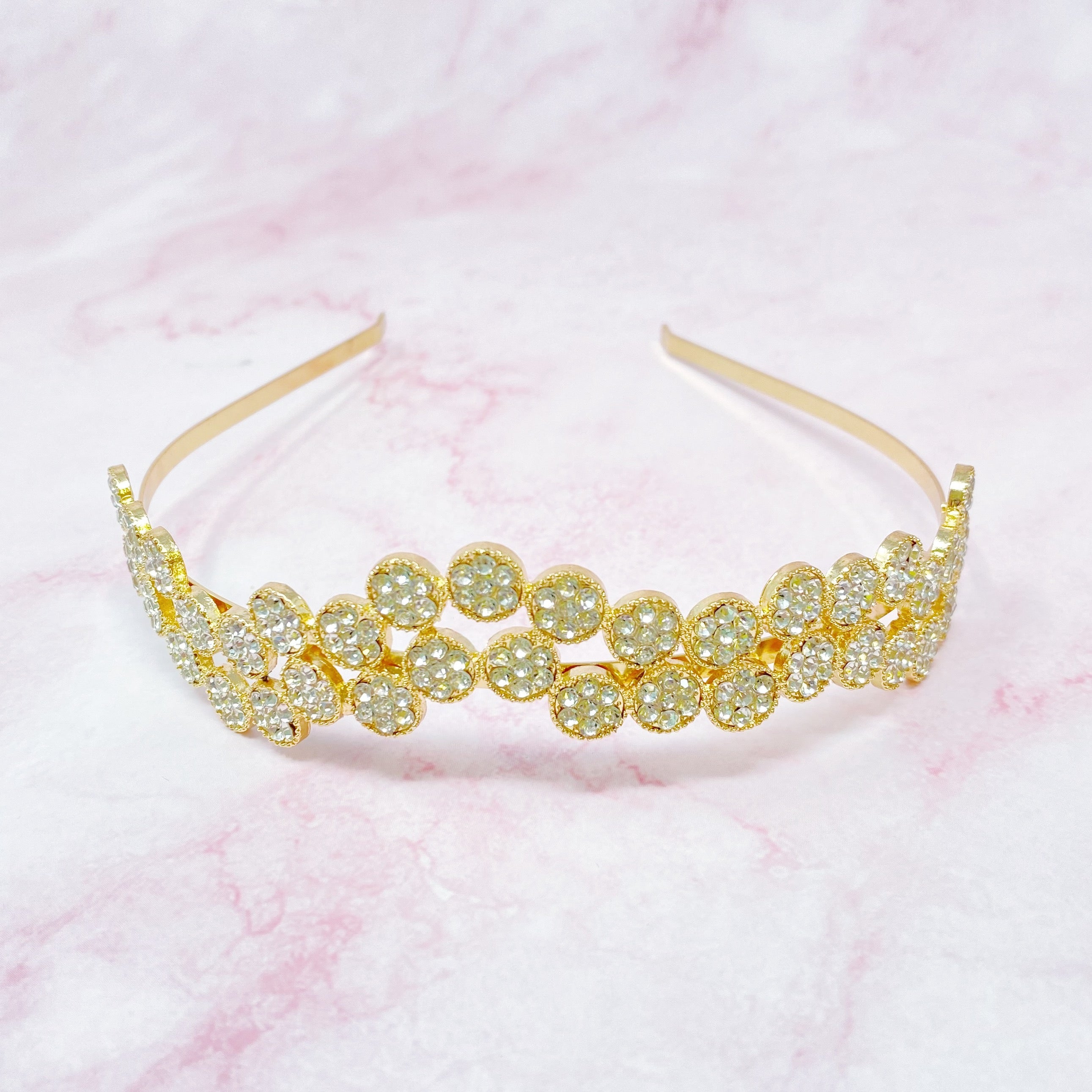 Shines In Circles Headband featuring sparkly circles in a wavy design, perfect for enhancing outfits.