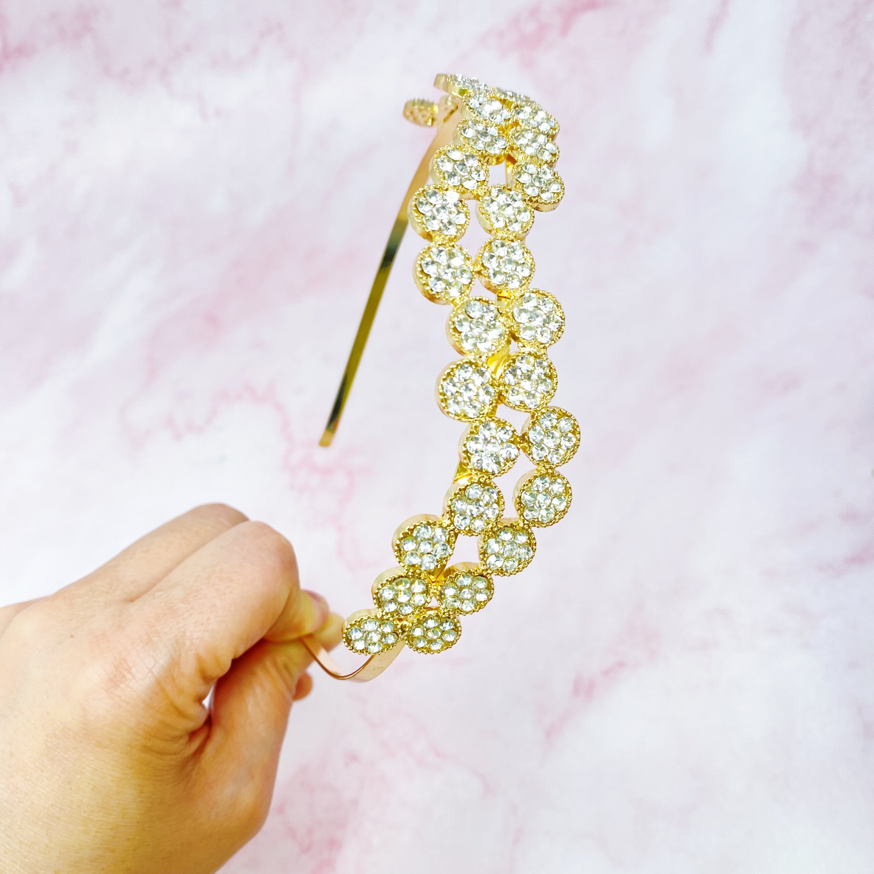 Shines In Circles Headband featuring sparkly circles in a wavy design, perfect for enhancing outfits.