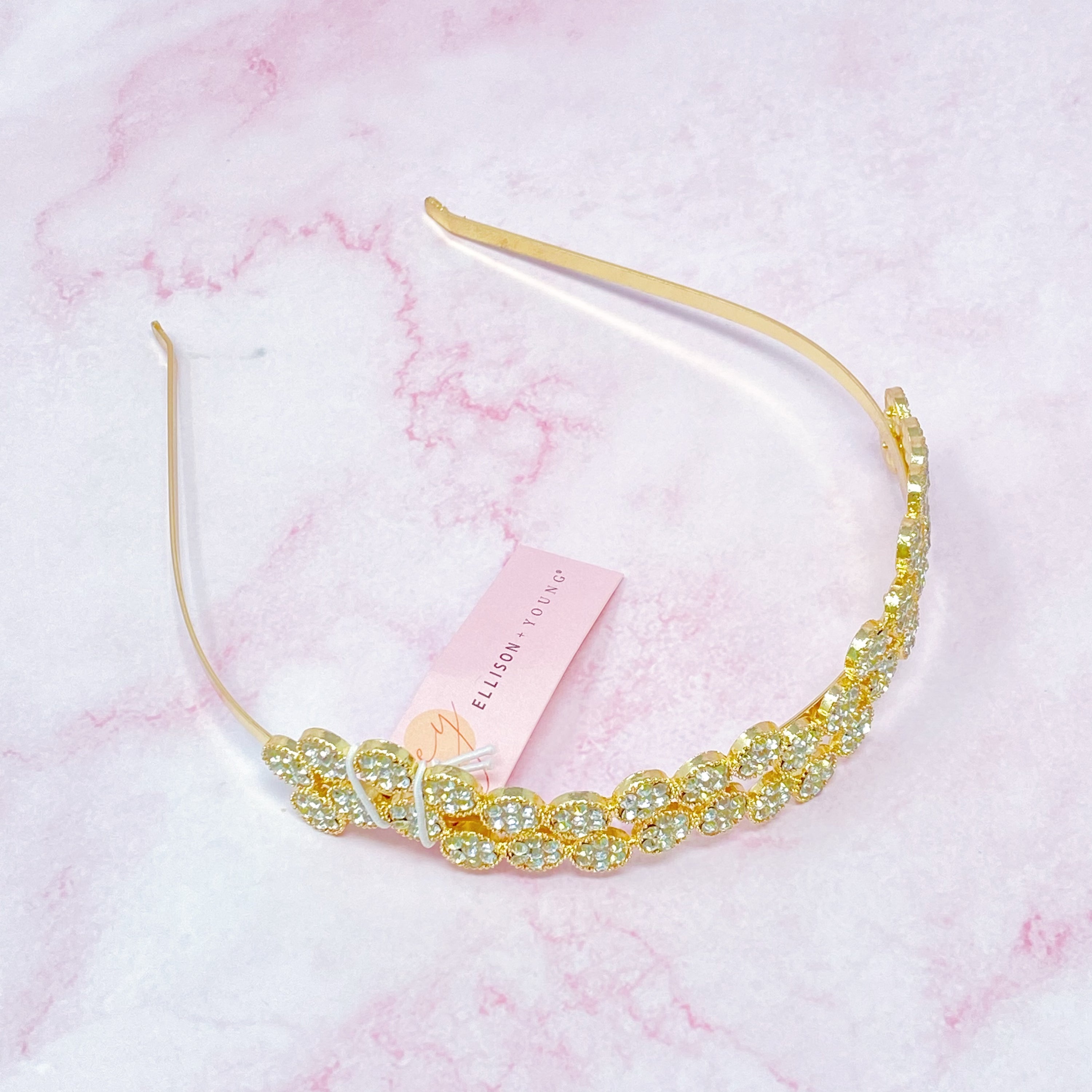 Shines In Circles Headband featuring sparkly circles in a wavy design, perfect for enhancing outfits.