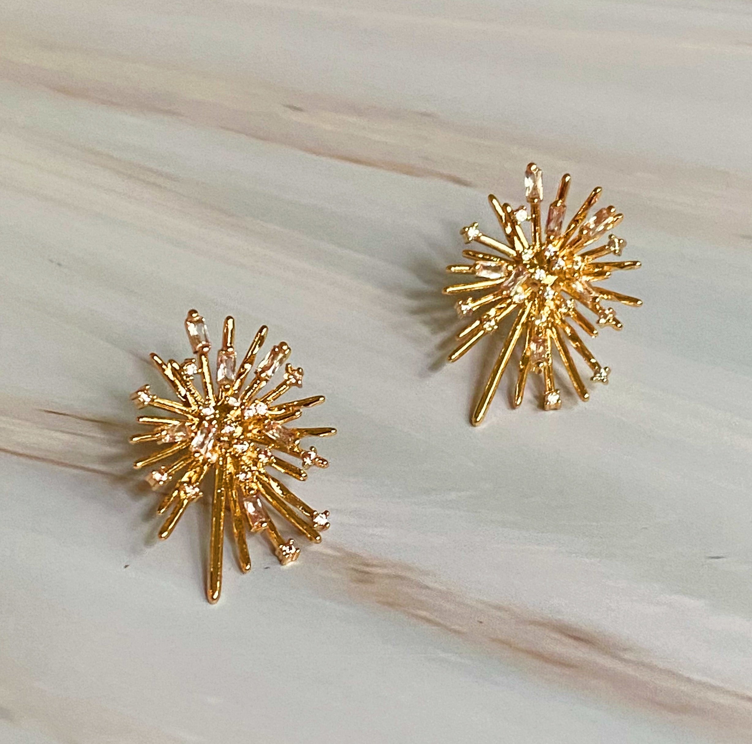 Shines Spreads Stud Earrings featuring a spiky design adorned with sparkling stones, perfect for any occasion.