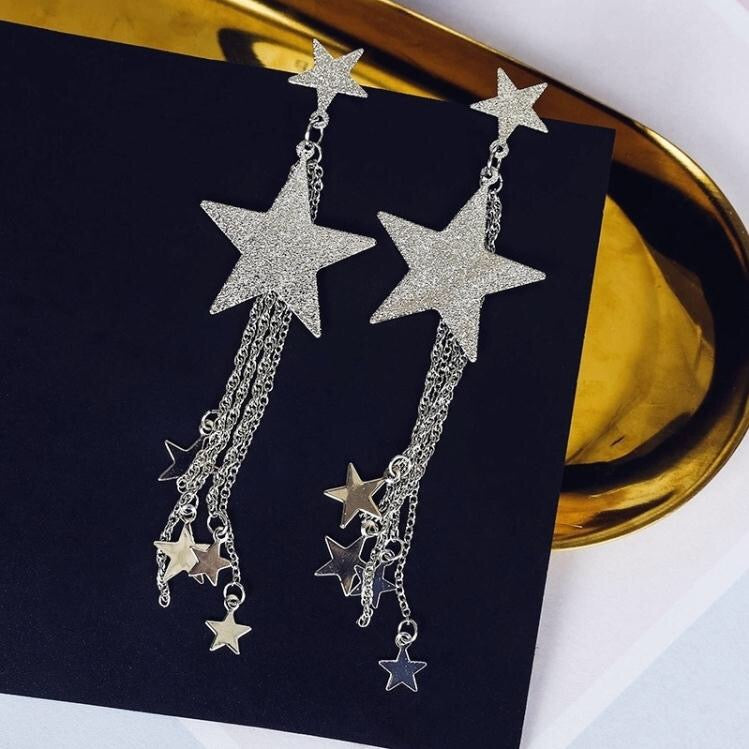 A pair of elegant Shining Multi-Stars with Tassels Earrings made from alloy, featuring a shimmering star design and stylish tassels.