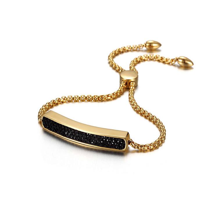 A shiny linear friendship bar bracelet made of 316L surgical stainless steel with 14K gold PVD plating, showcasing its elegant design.