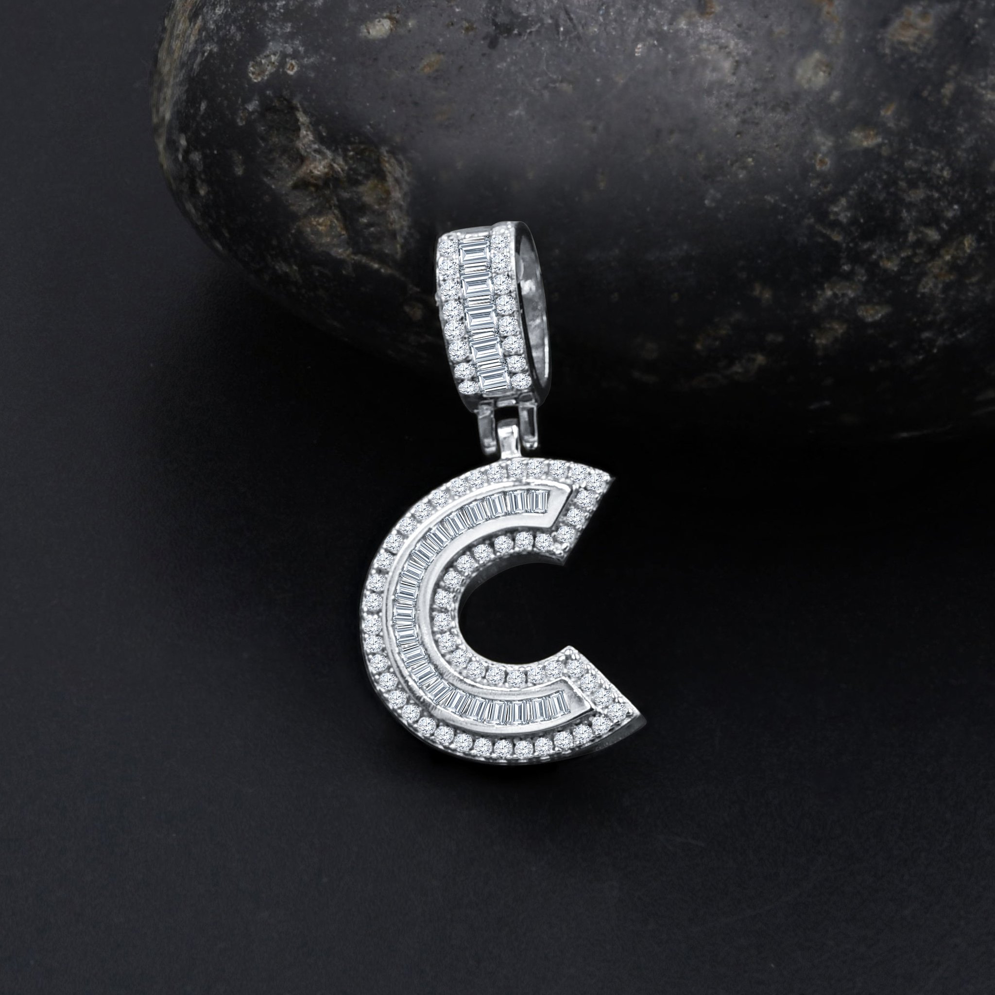 SIGNARY Silver Pendant featuring an initial design with cubic zirconia stones, crafted from 925 sterling silver.