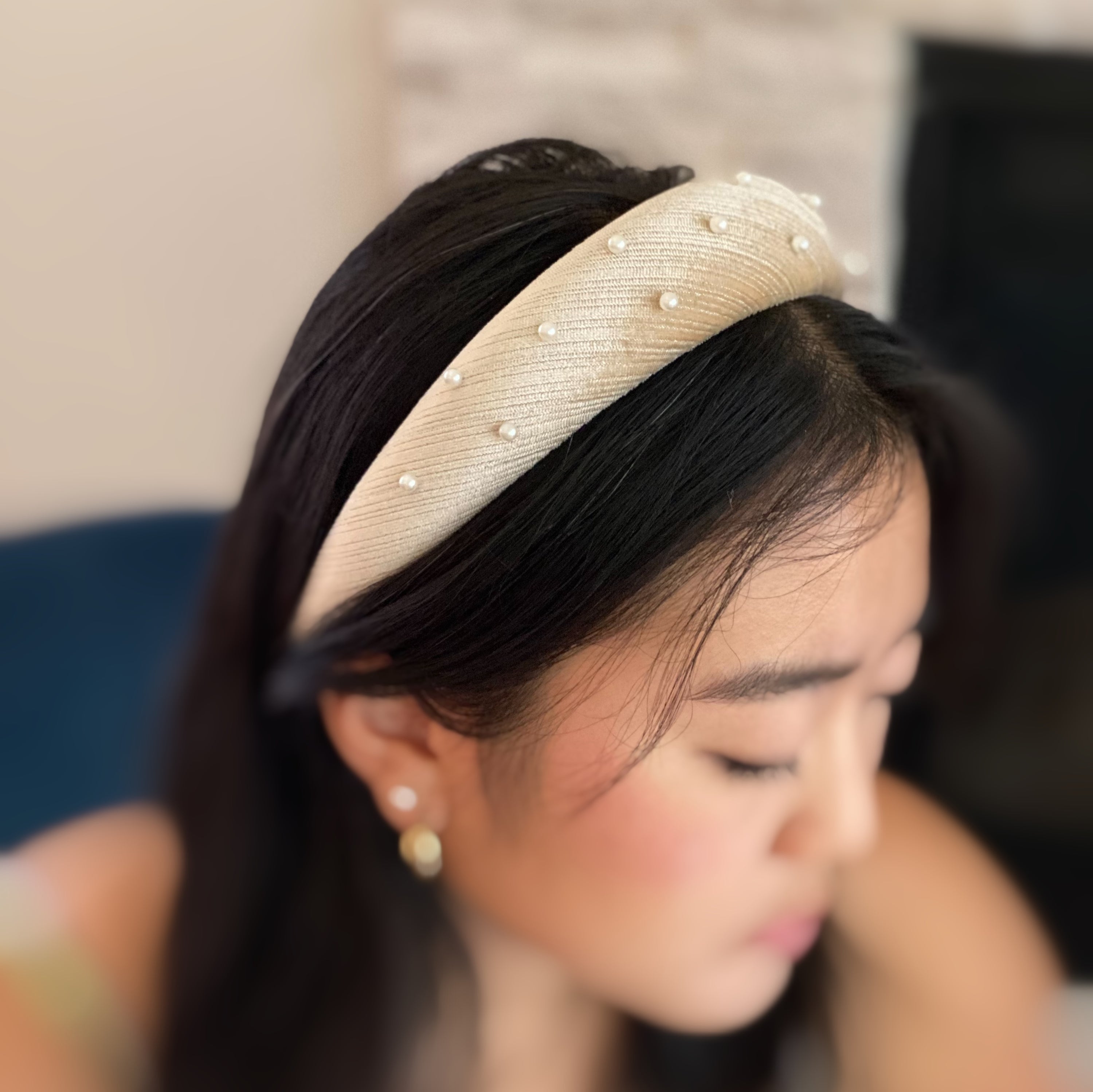 A luxurious handmade Silky Velvet Pearl Headband featuring textured velvet and delicate pearls, perfect for special occasions.