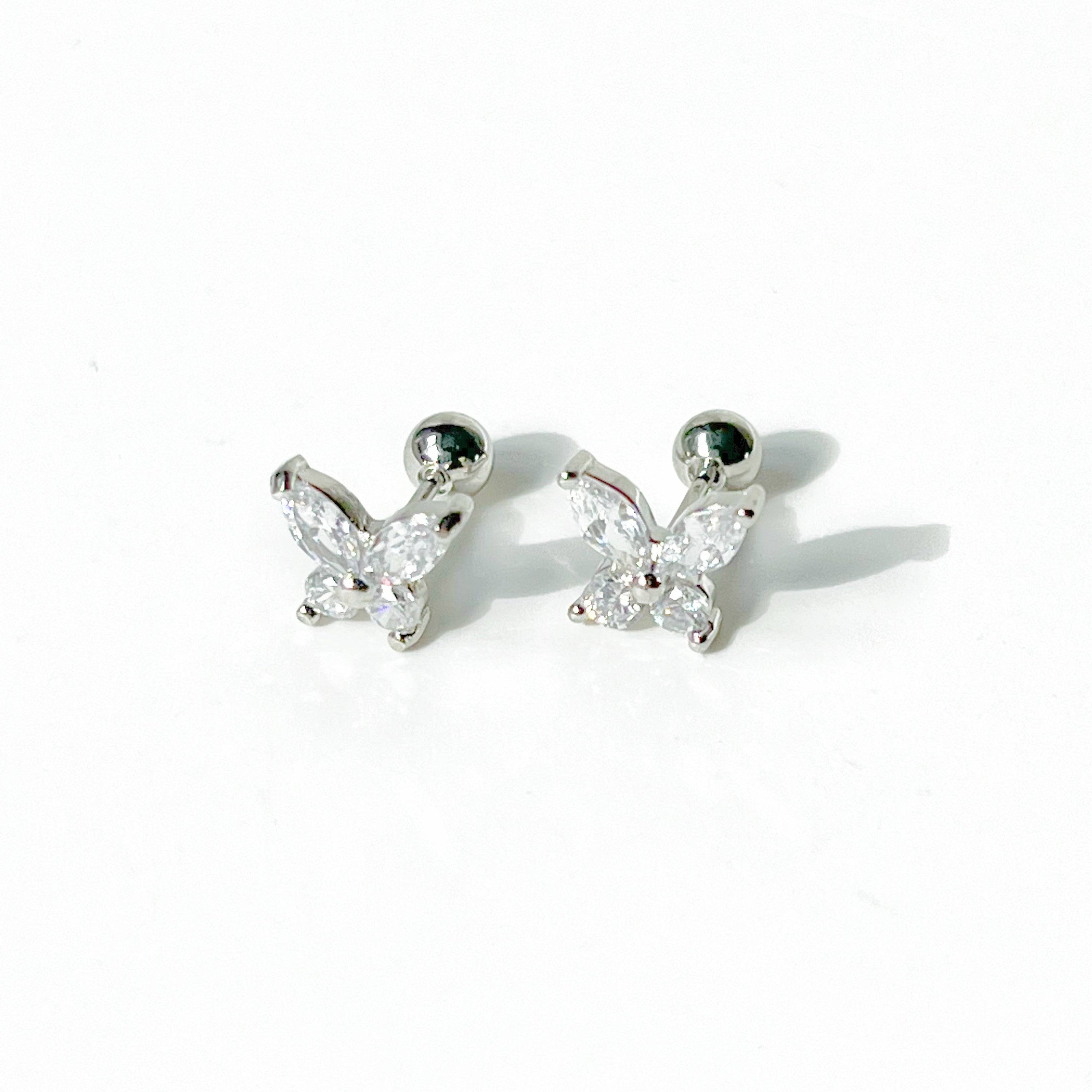 A pair of elegant silver butterfly earrings adorned with clear zircon, showcasing a delicate design.