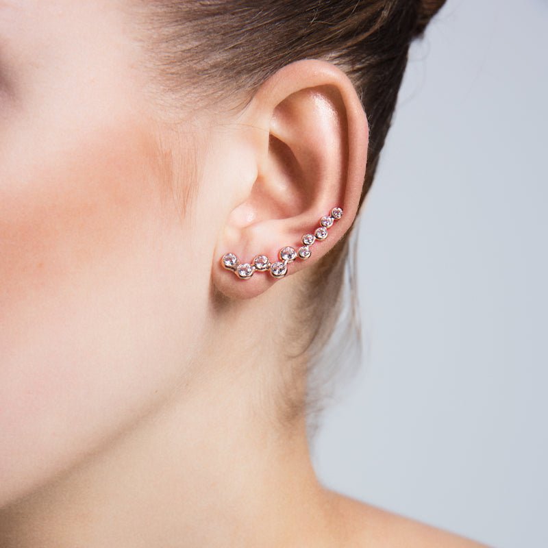 A pair of Silver Diamond Bubble Ear Cuffs & Climber Earrings featuring clear CZ crystals and available in multiple finishes.