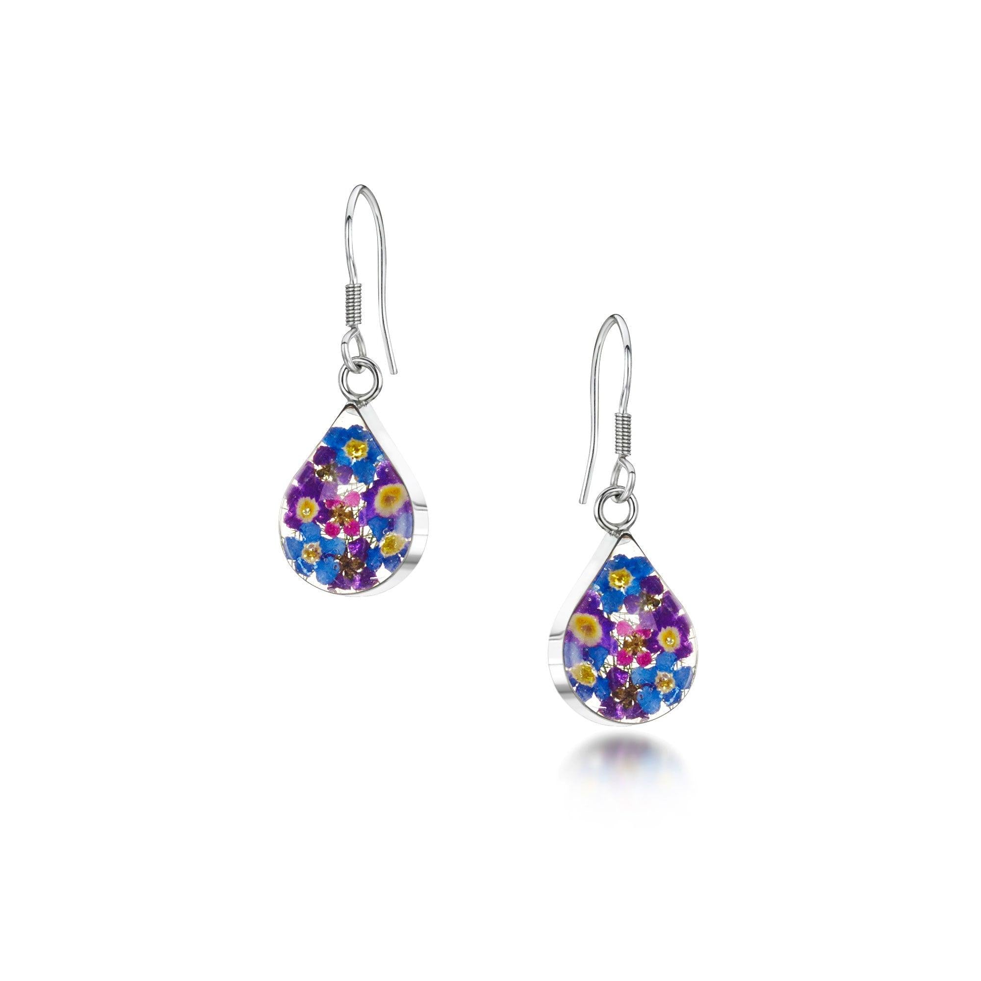 Handmade sterling silver drop earrings featuring real purple verbena and forget-me-not flowers in a teardrop design.