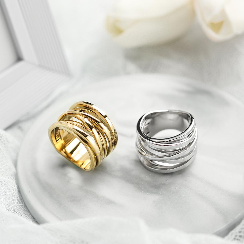 A close-up view of the Silver Intertwined Statement Ring, showcasing its elegant intertwined design and shiny finish.