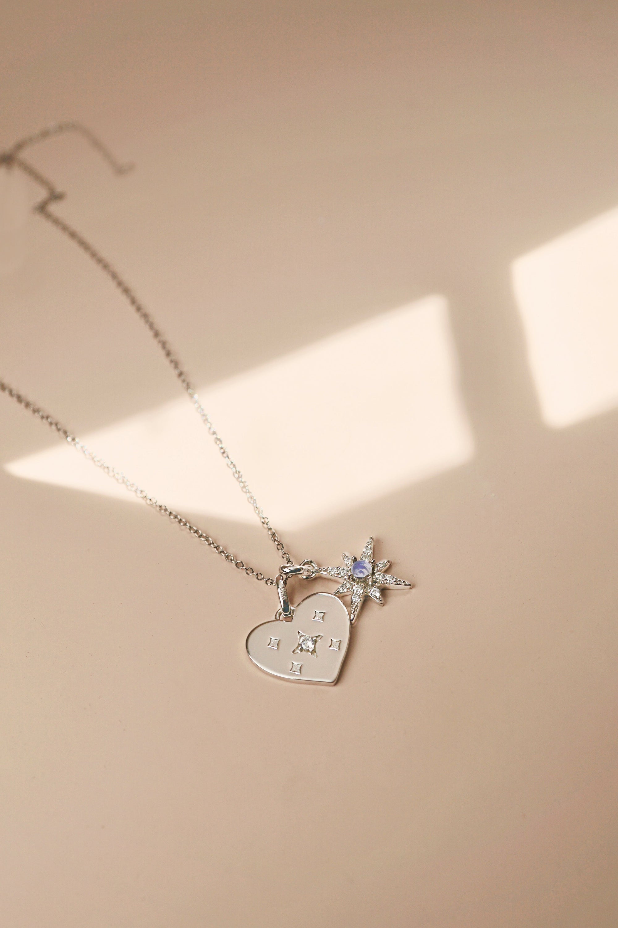 A beautifully crafted Silver North Star Charm, symbolizing hope and guidance, featuring a delicate 15mm pendant.