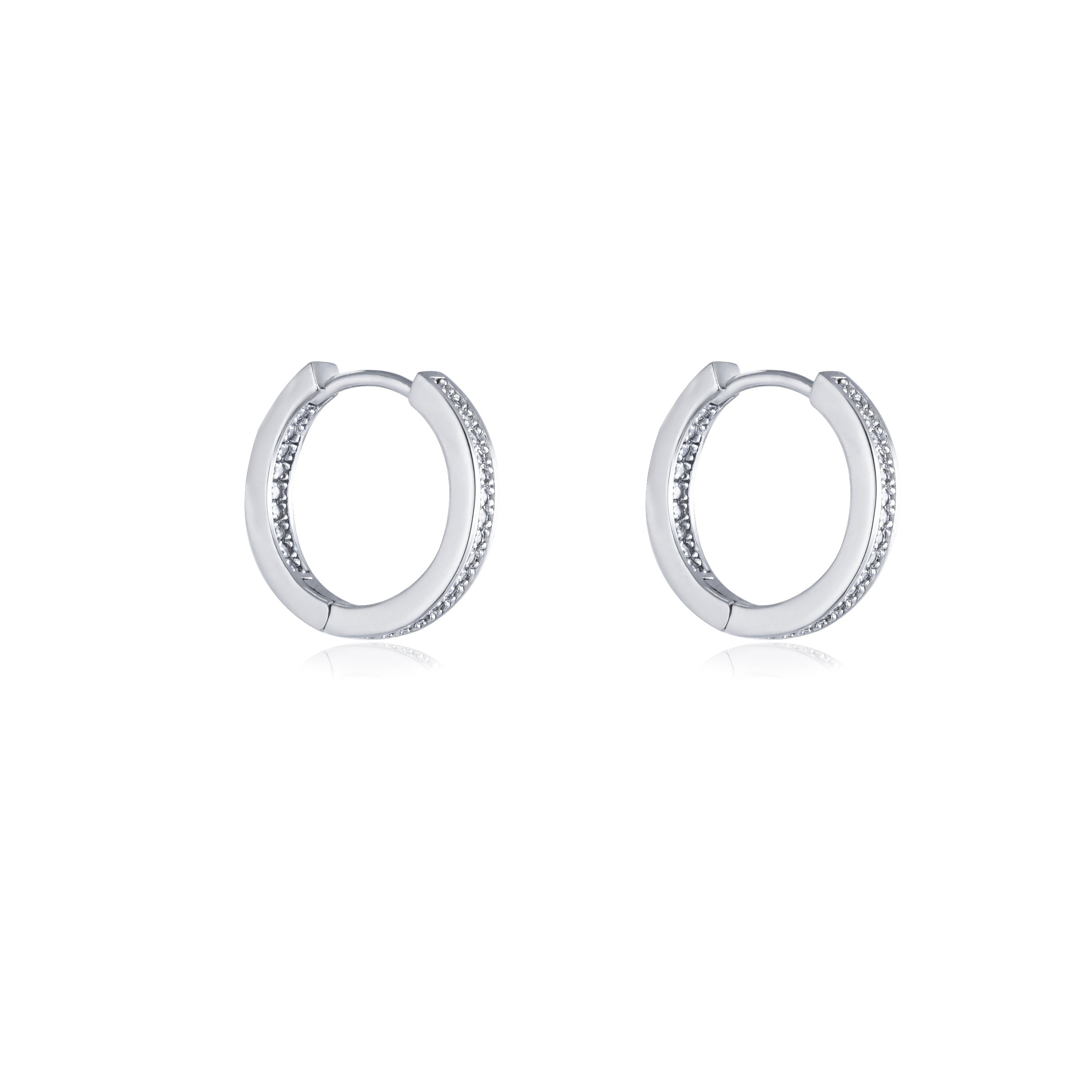 A pair of silver pave small huggie earrings featuring white sapphires, crafted from 925 sterling silver with a white gold finish.