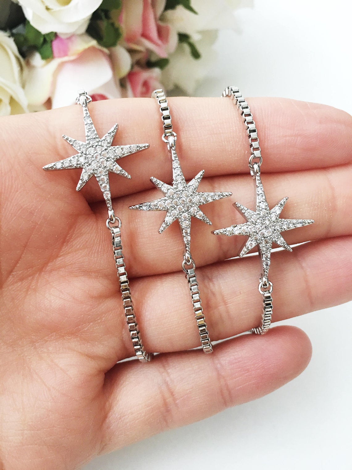 Adjustable Silver Star Bracelet featuring a sparkling zircon star charm, handmade with tarnish-resistant stainless steel.