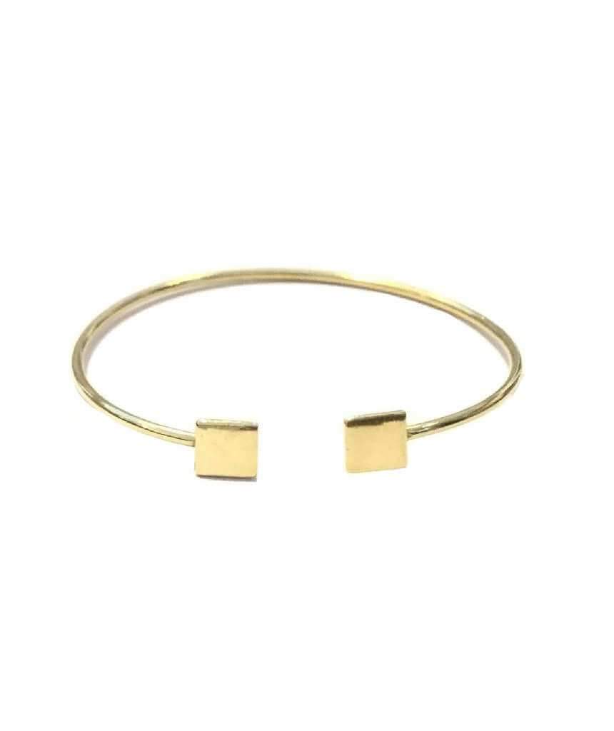 A simple geometric bracelet in gold and silver, showcasing its adjustable design and elegant craftsmanship.