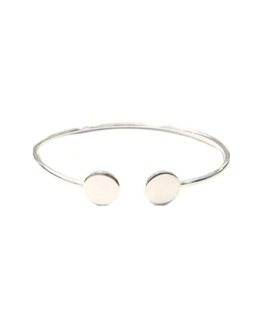 A simple geometric bracelet in gold and silver, showcasing its adjustable design and elegant craftsmanship.