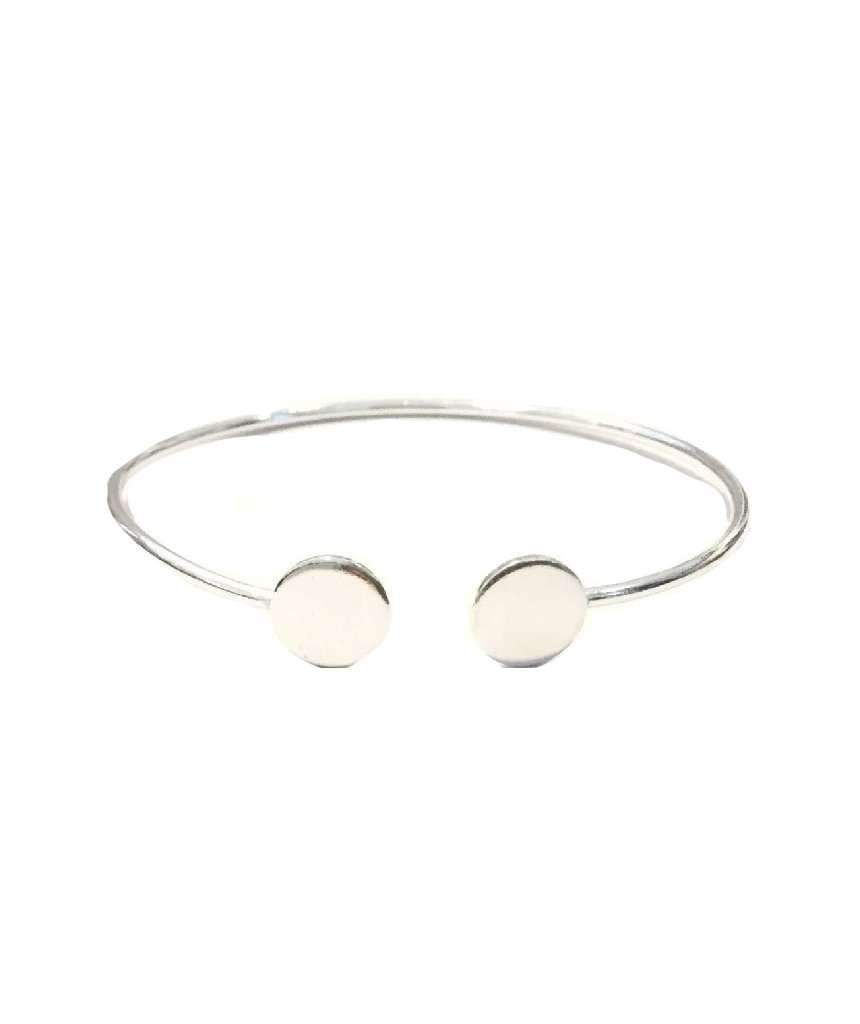 A simple geometric bracelet in gold and silver, showcasing its adjustable design and elegant craftsmanship.