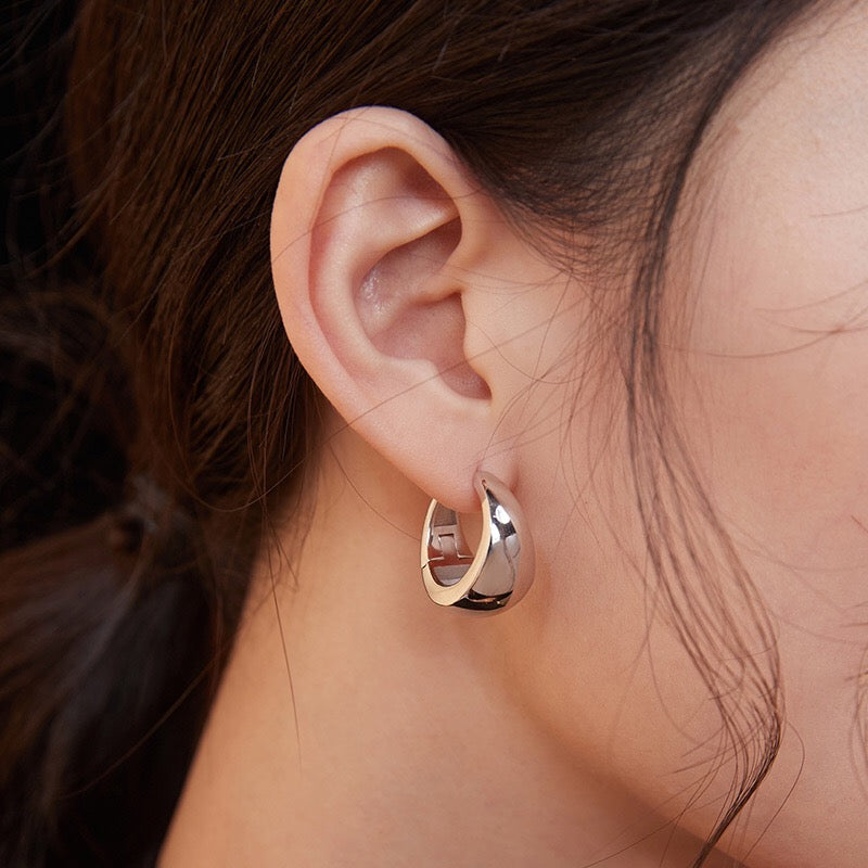 A pair of handmade Simple Geometric Metal Cuff Earrings crafted from sterling silver with a gold vermeil finish, showcasing a modern geometric design.