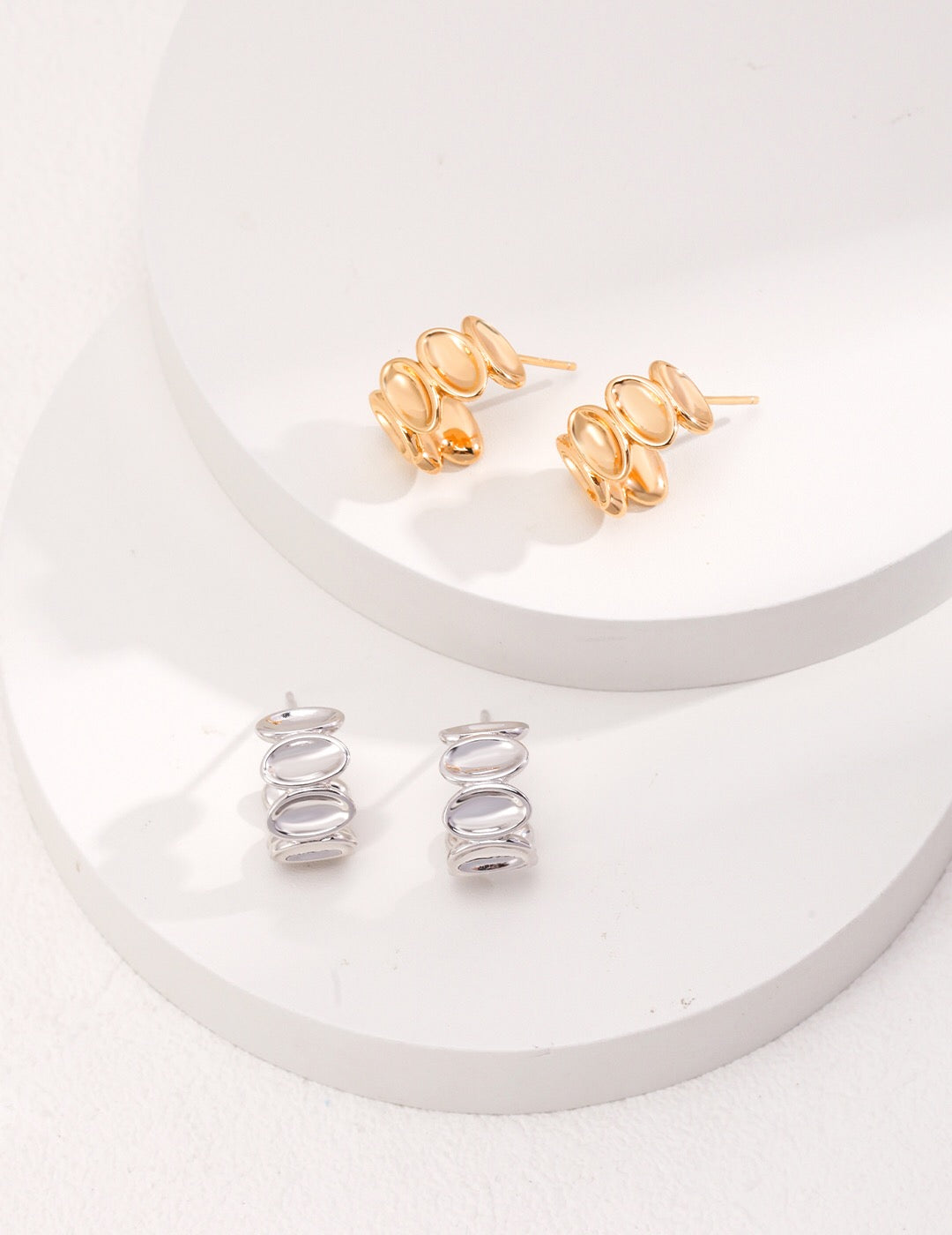 A pair of handmade Simple Style Stud Earrings made of gold vermeil, showcasing their elegant design and size.