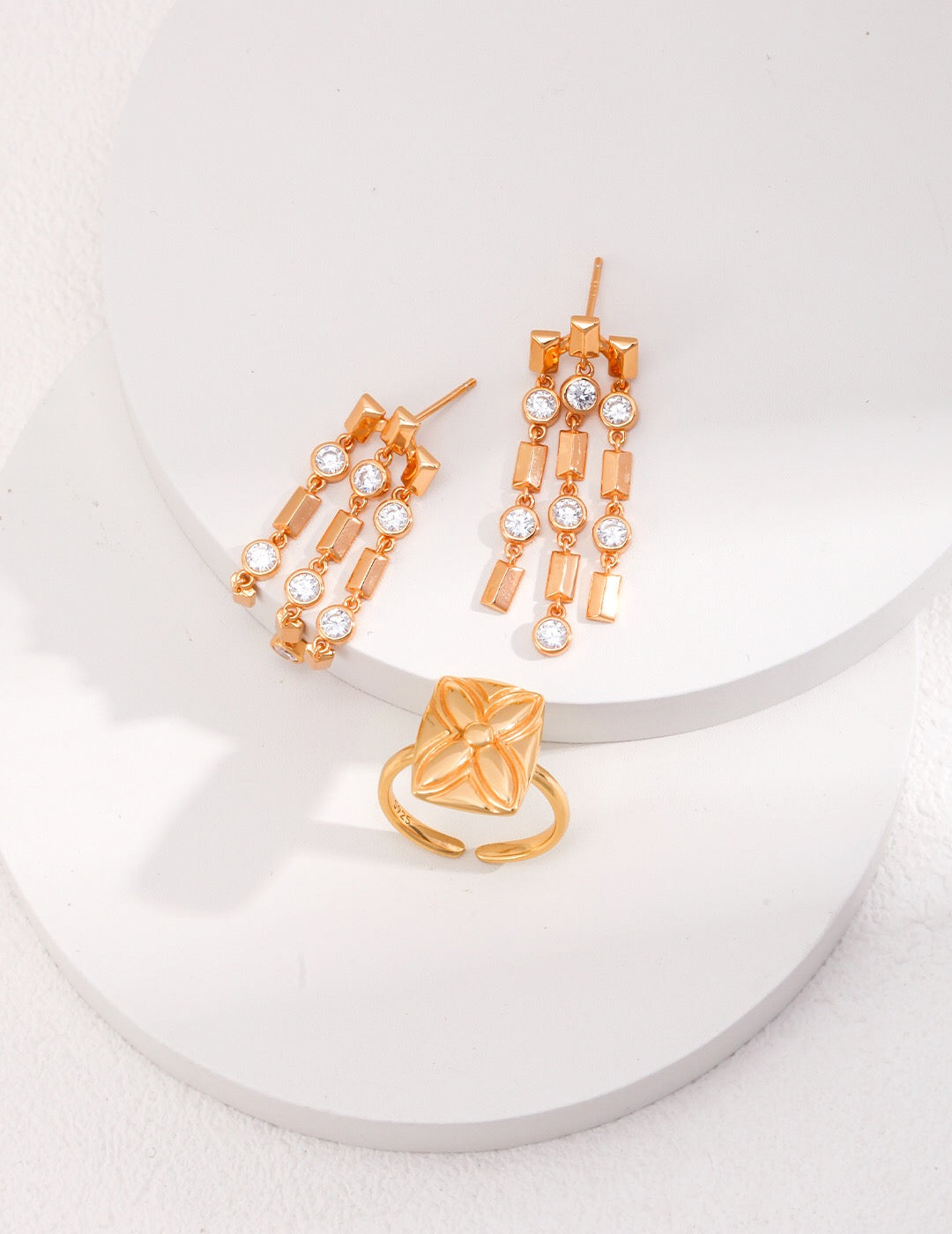 A pair of elegant Simple Tassel Zircon Earrings featuring zircon stones and gold vermeil, showcasing their intricate design and craftsmanship.