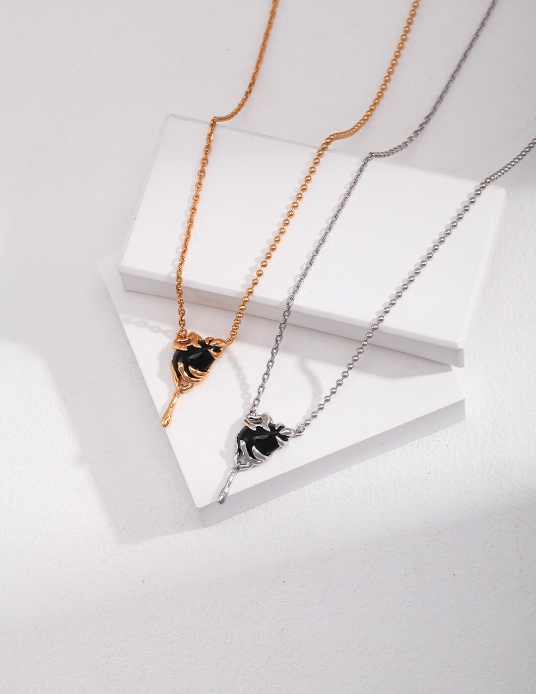 A handmade Simple Vintage Black Agate Necklace featuring a black agate pendant and gold vermeil chain, elegantly displayed on a soft background.