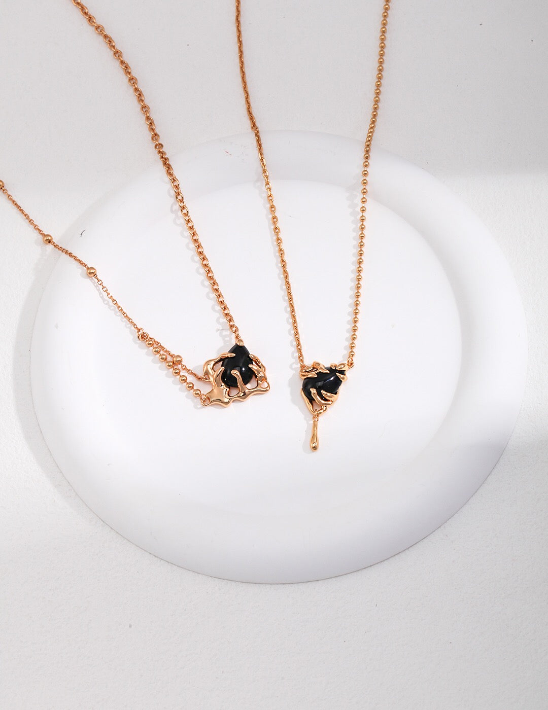 A handmade Simple Vintage Black Agate Necklace featuring a black agate pendant and gold vermeil chain, elegantly displayed on a soft background.