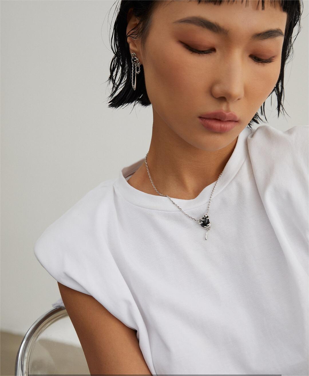 A handmade Simple Vintage Black Agate Necklace featuring a black agate pendant and gold vermeil chain, elegantly displayed on a soft background.