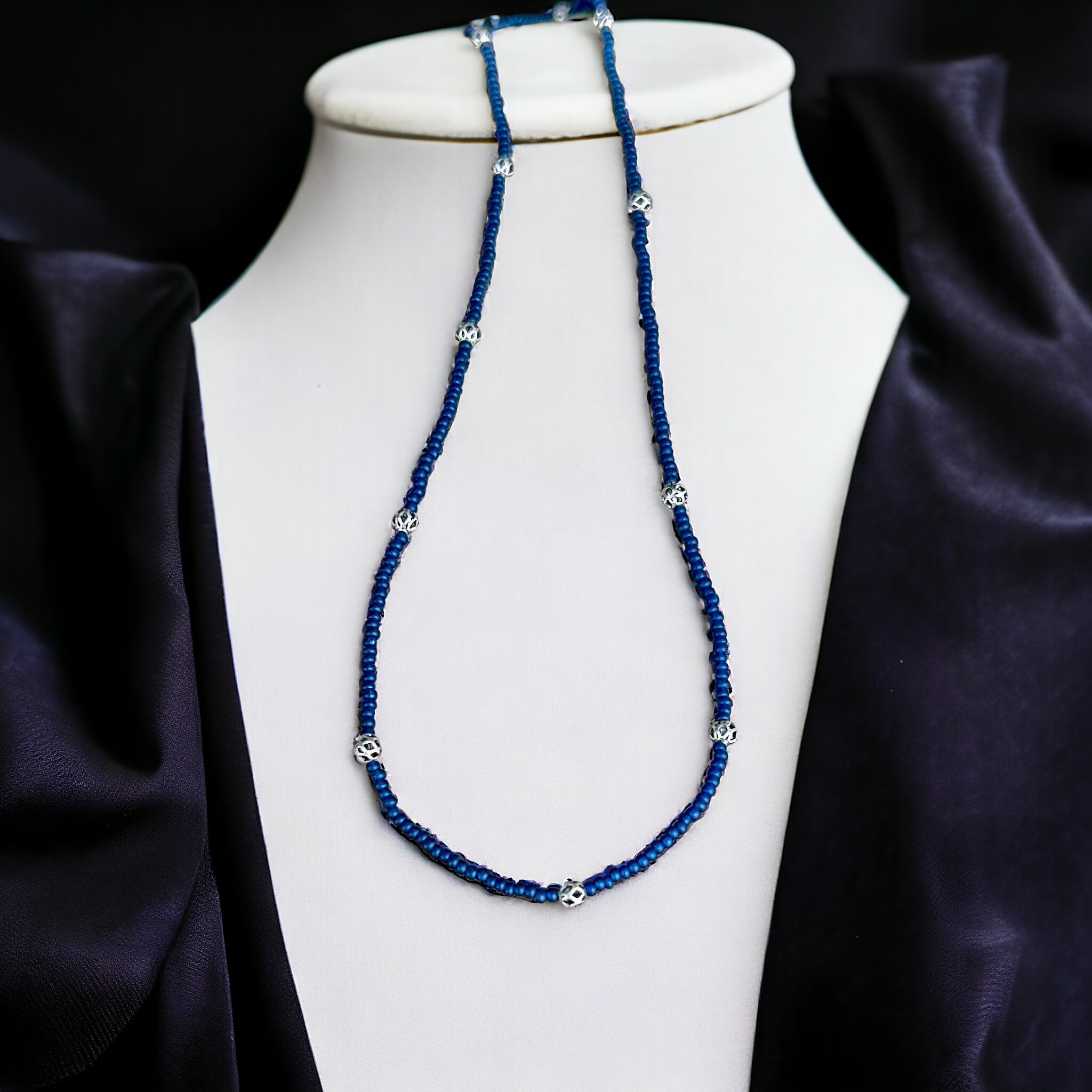 Simply Delicate Navy Blue Seed Bead Stretchy Necklace featuring antique silver lattice beads on elastic cording, perfect for Boho style.