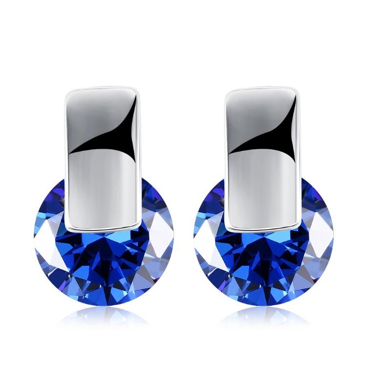 A pair of elegant Simulated Sapphire Sleek Bar Earrings set in 18K white gold, showcasing their stunning design and craftsmanship.