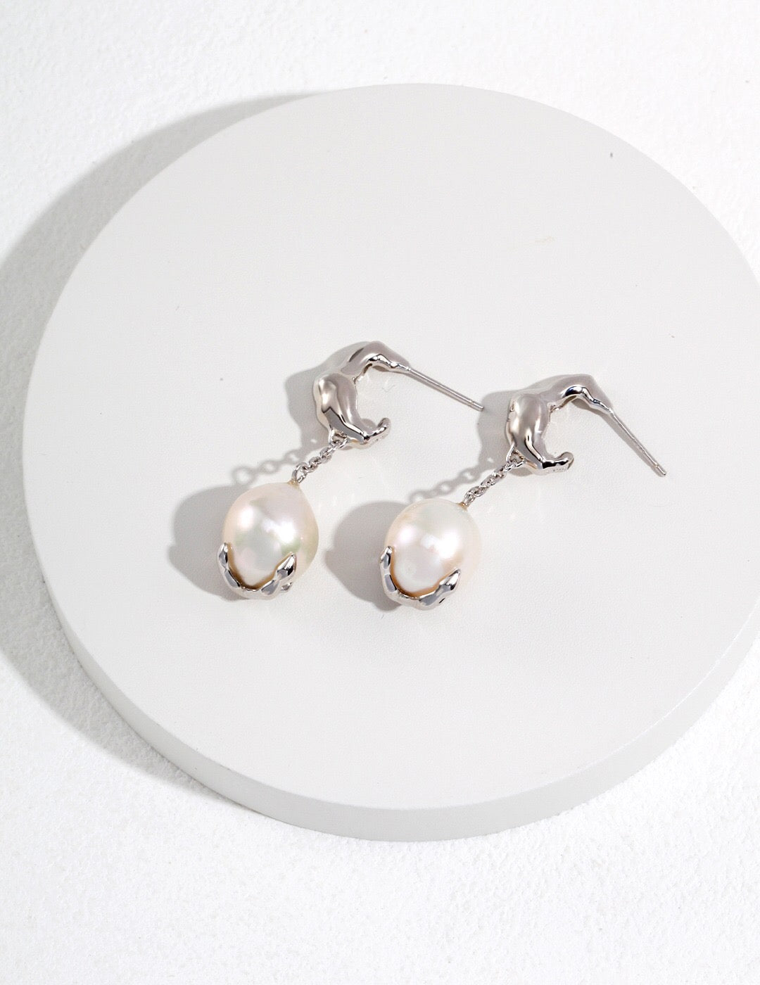 Elegant Single Dangle Teardrop Pearl Earrings featuring natural pearls and sterling silver, perfect for any occasion.