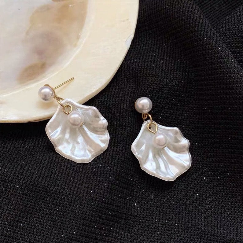 A pair of elegant short earrings featuring a unique shell design adorned with artificial pearls, made from alloy and S925 material.