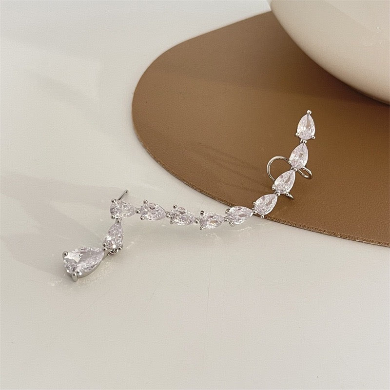 Single Shining Arc-Shaped Multi Zircon Water Drops Ear Stud and Clip featuring elegant design and sparkling accents.