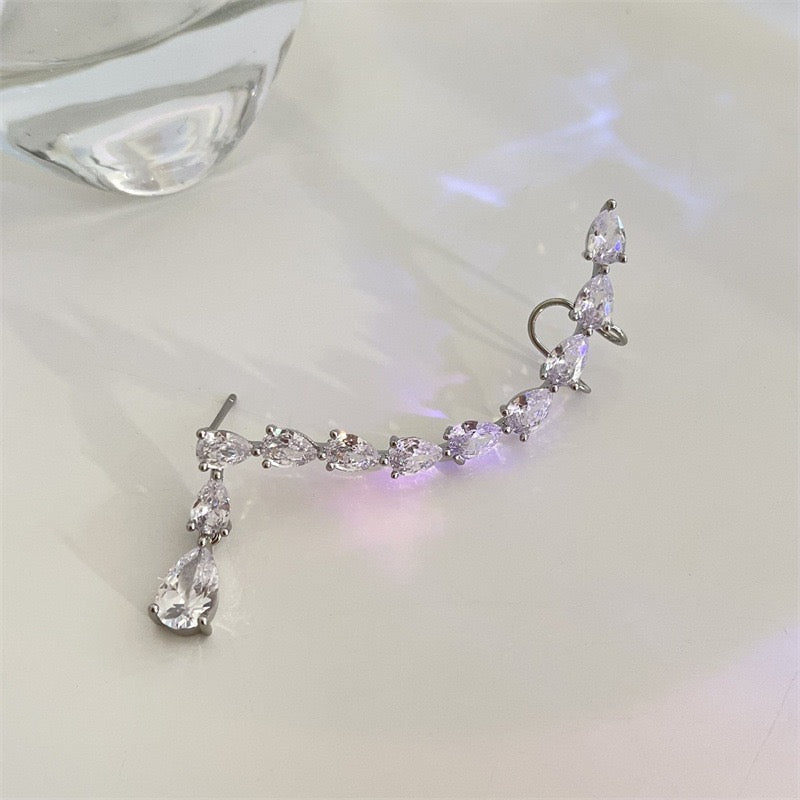 Single Shining Arc-Shaped Multi Zircon Water Drops Ear Stud and Clip featuring elegant design and sparkling accents.