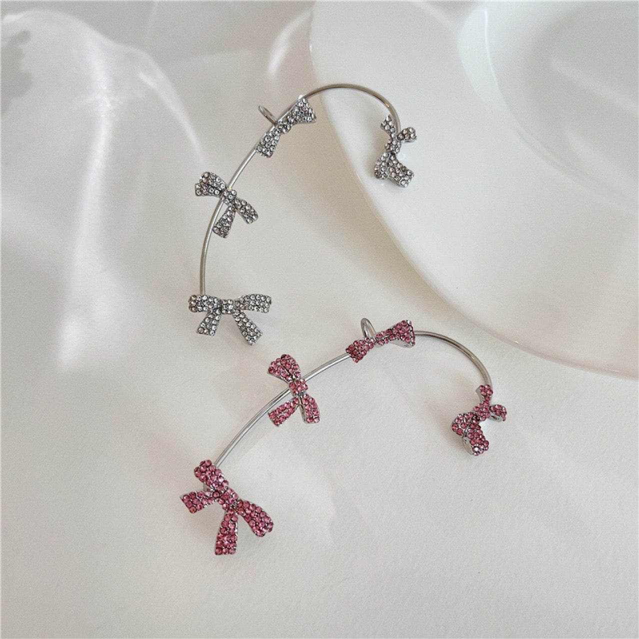 Single Various Bowknot Ear-Hook made of alloy and rhinestones, showcasing an elegant bowknot design.