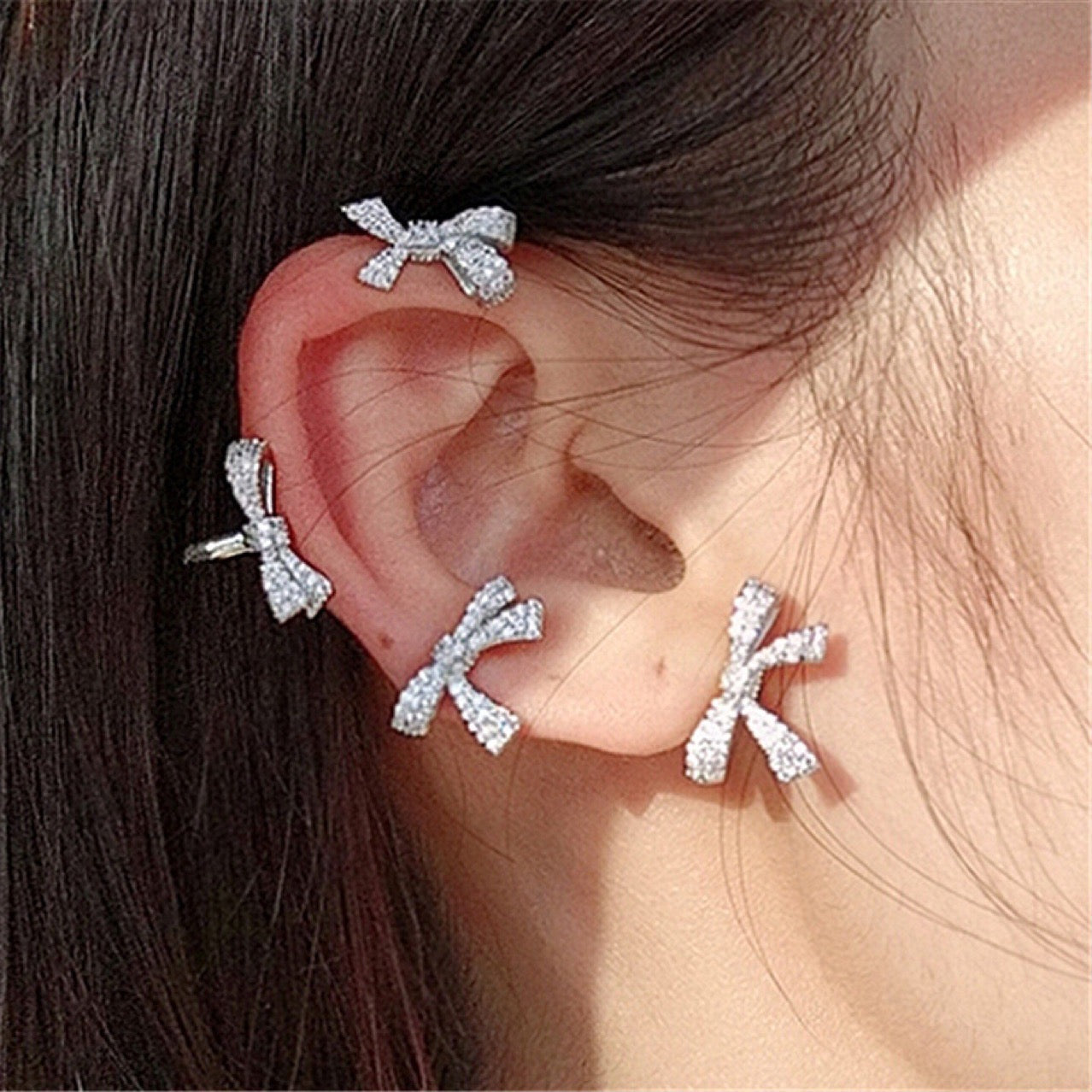 Single Various Bowknot Ear-Hook made of alloy and rhinestones, showcasing an elegant bowknot design.