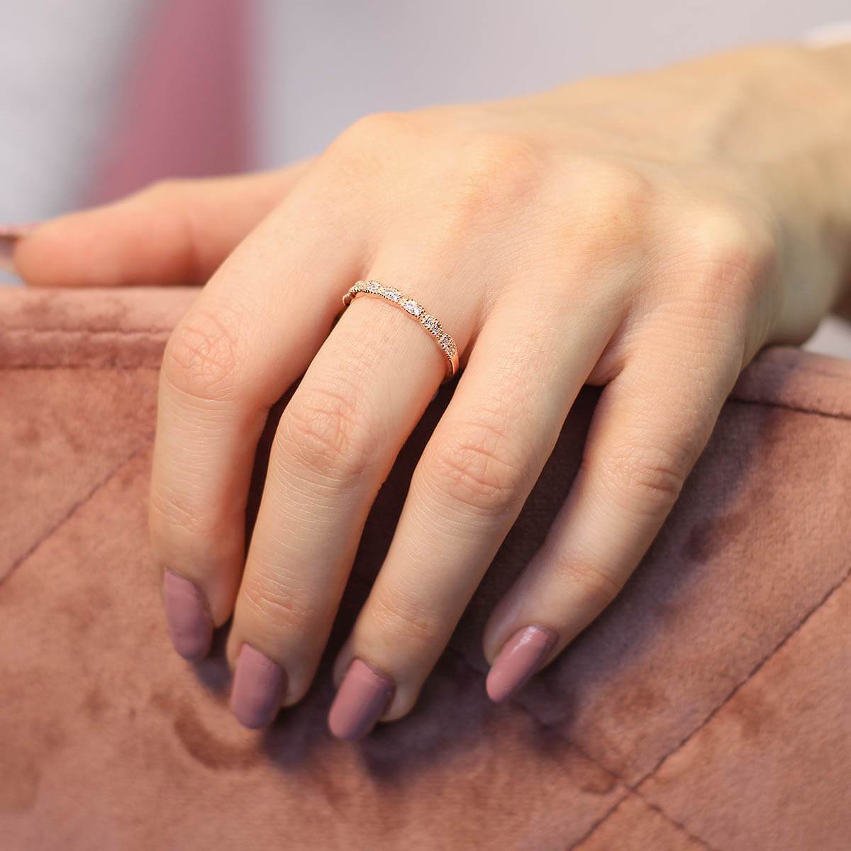 A close-up of the Skinny ultra slim stacking pave ring featuring round brilliant cut sparkles and milgrain edge detail.