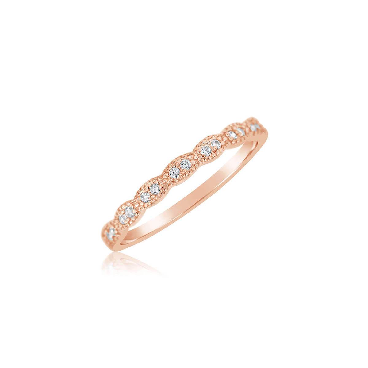 A close-up of the Skinny ultra slim stacking pave ring featuring round brilliant cut sparkles and milgrain edge detail.