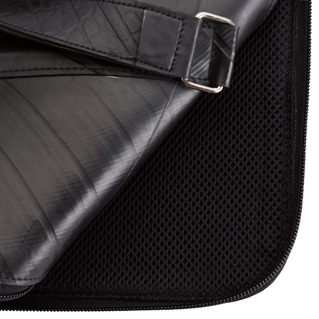 Eco-friendly Slimline Inner Tube Padded Laptop Bag with unique tread patterns, suitable for 13-inch laptops.