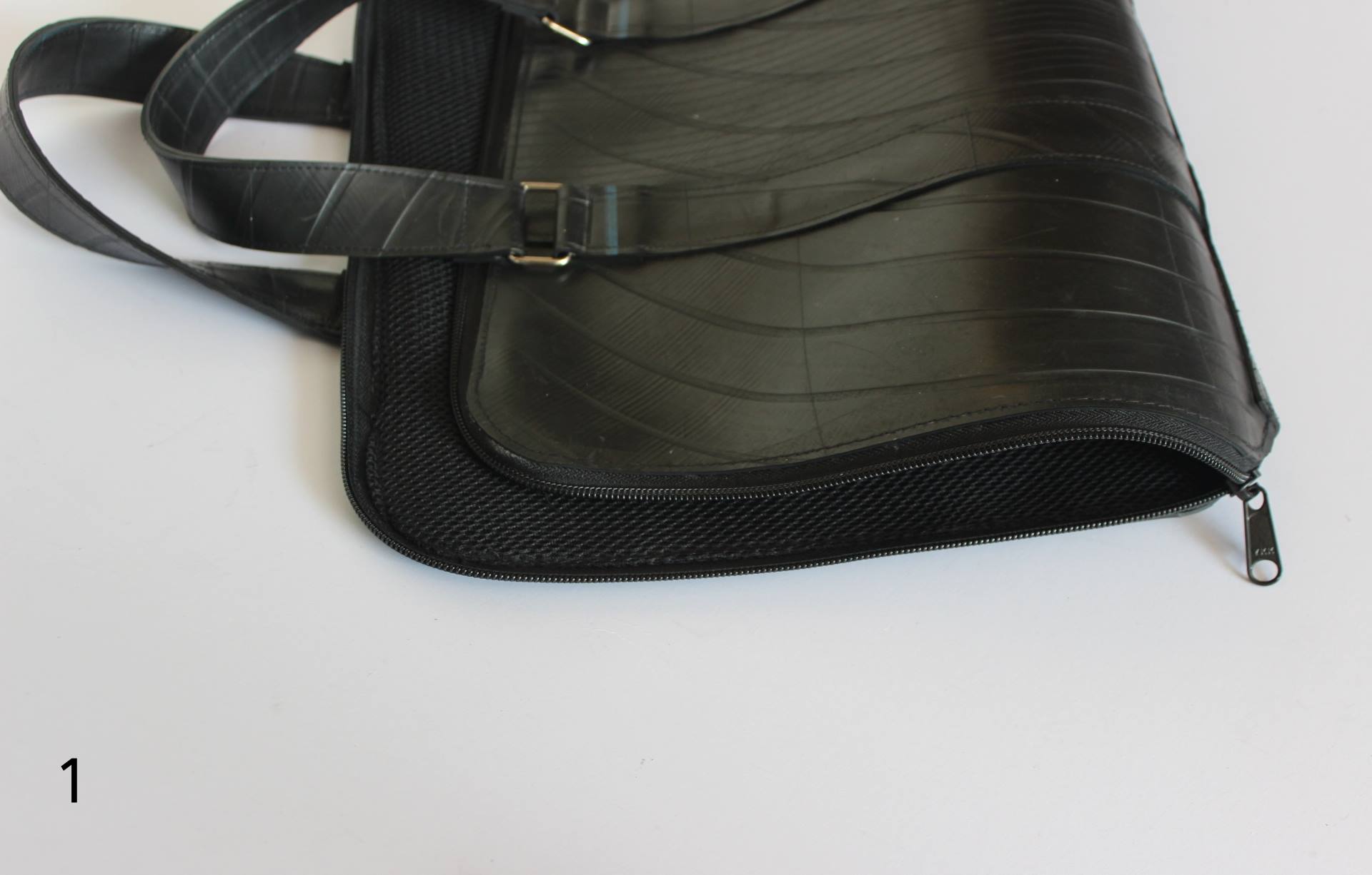 Eco-friendly Slimline Inner Tube Padded Laptop Bag with unique tread patterns, suitable for 13-inch laptops.